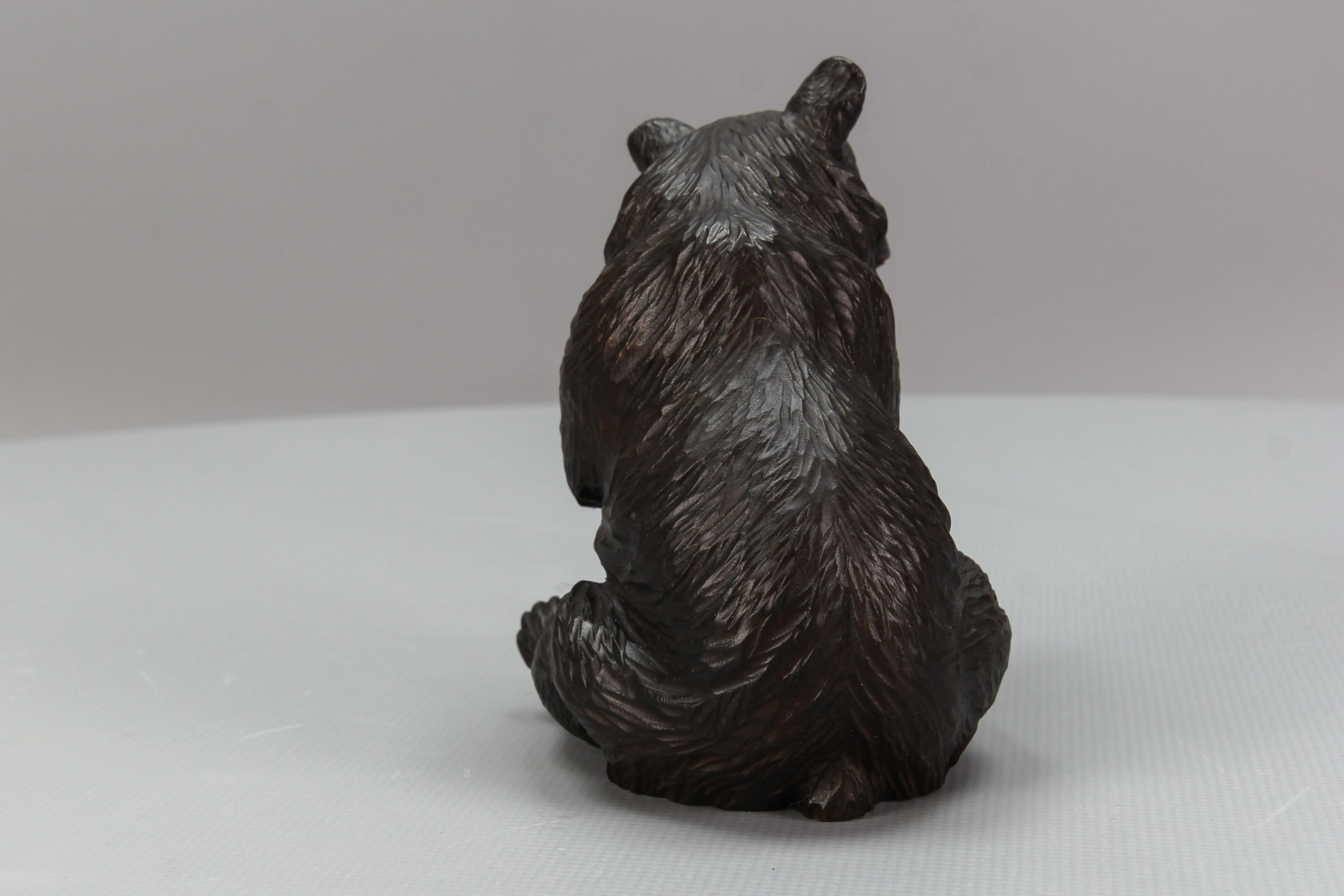 Early 20th Century Antique Black Forest Carved Seated Bear Figure For Sale