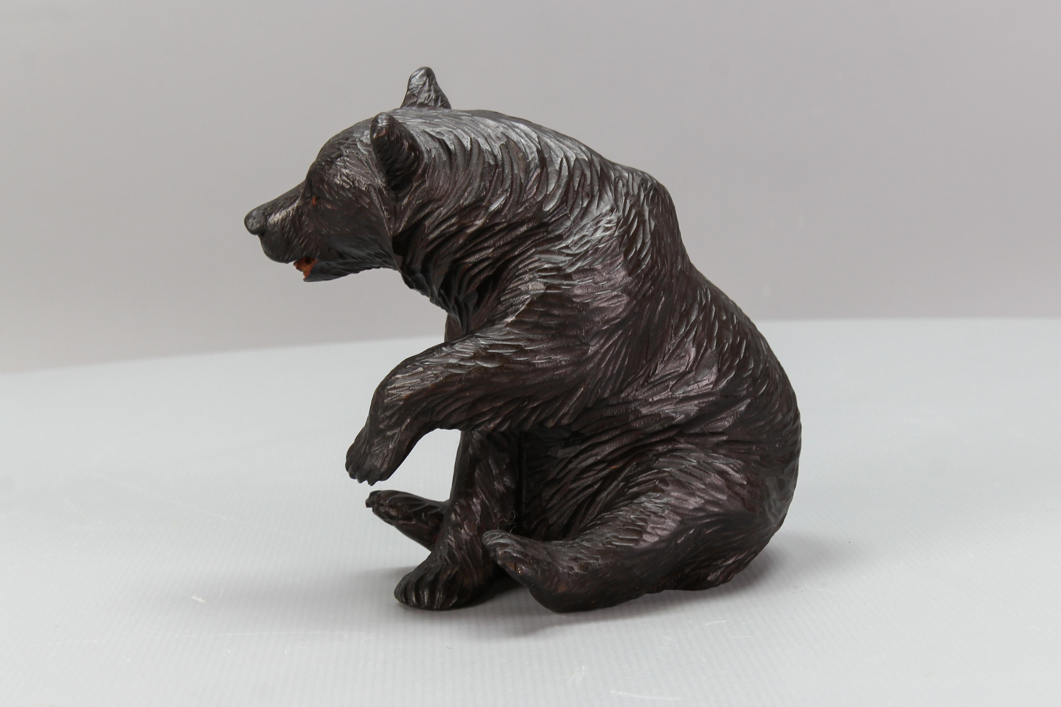 Wood Antique Black Forest Carved Seated Bear Figure For Sale