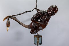 Lustre ancien de la Black Forest en bois sculpté « Lustermannchen », Allemagne, vers 1890
