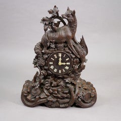 Antique Black Forest Clock Set with Carved Hunting Motifs, ca. 1900