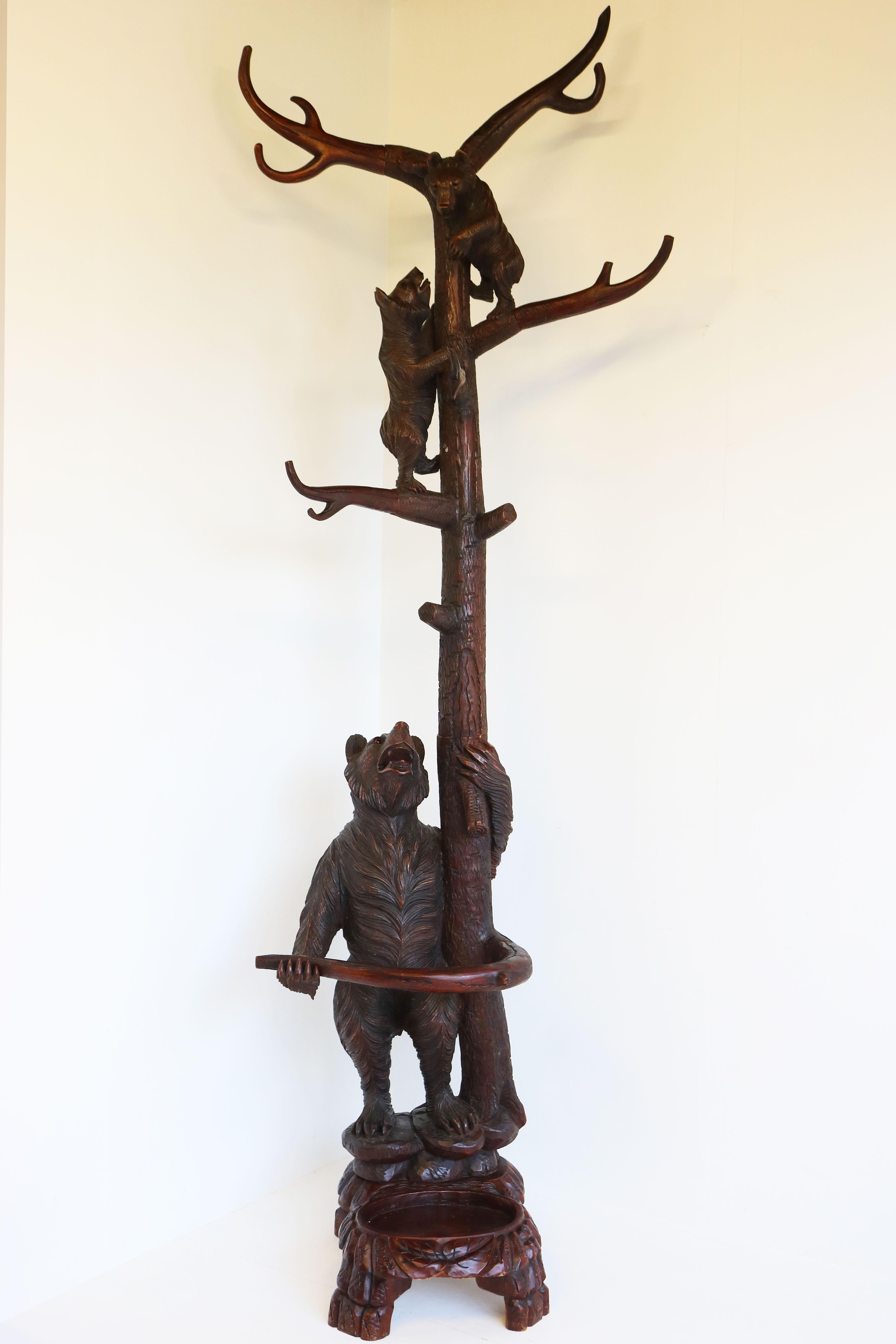 Make sure you always come home with a warm welcome with this marvelous Black Forest Coat rack in your hallway. 
Carved out of solid wood by a master carver this Black Forest bear Hall tree made in the early 1900s. 
2 Lovely charming bears climbing