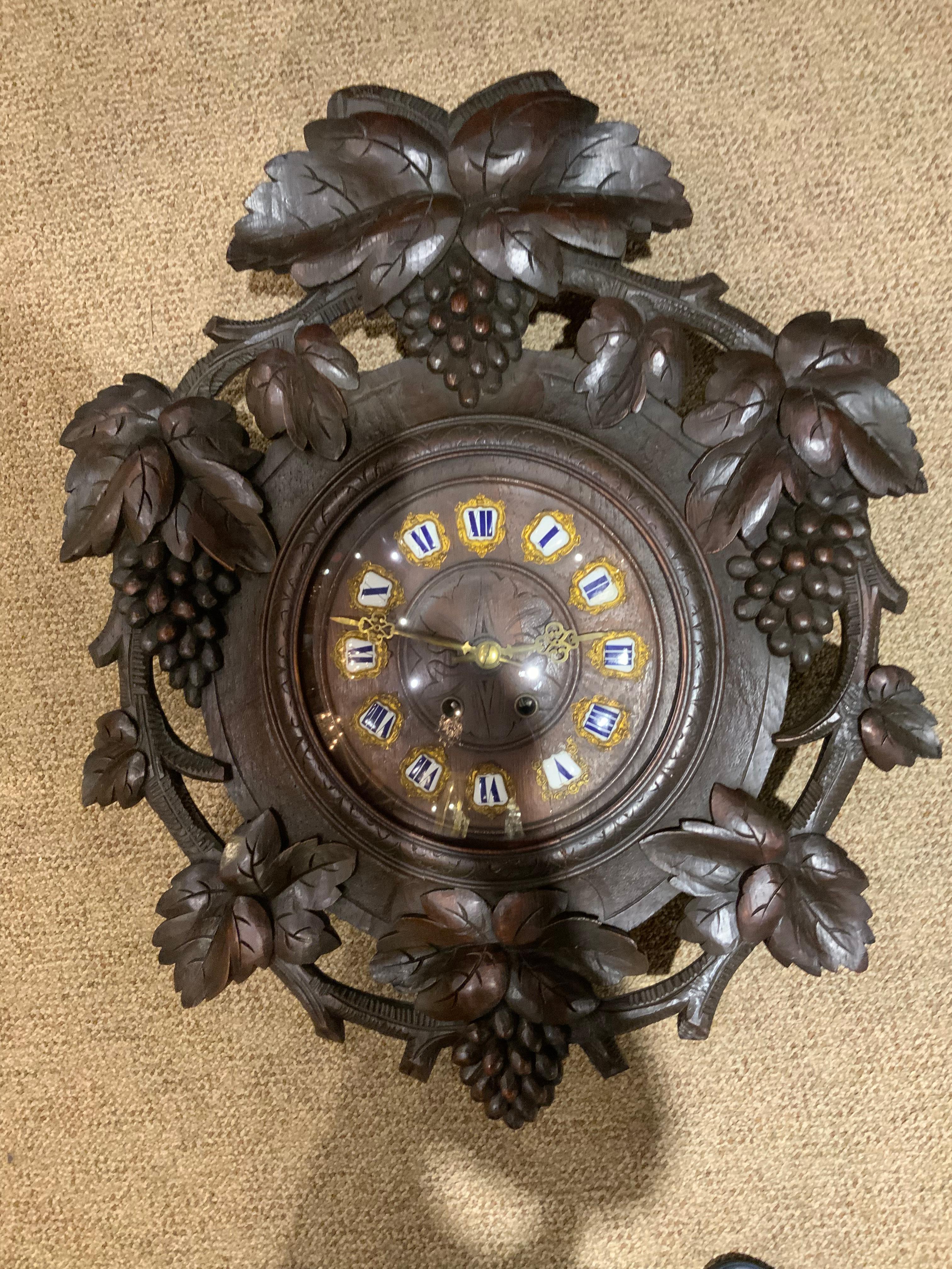 Swiss Antique Black Forest hand carved case wall clock For Sale