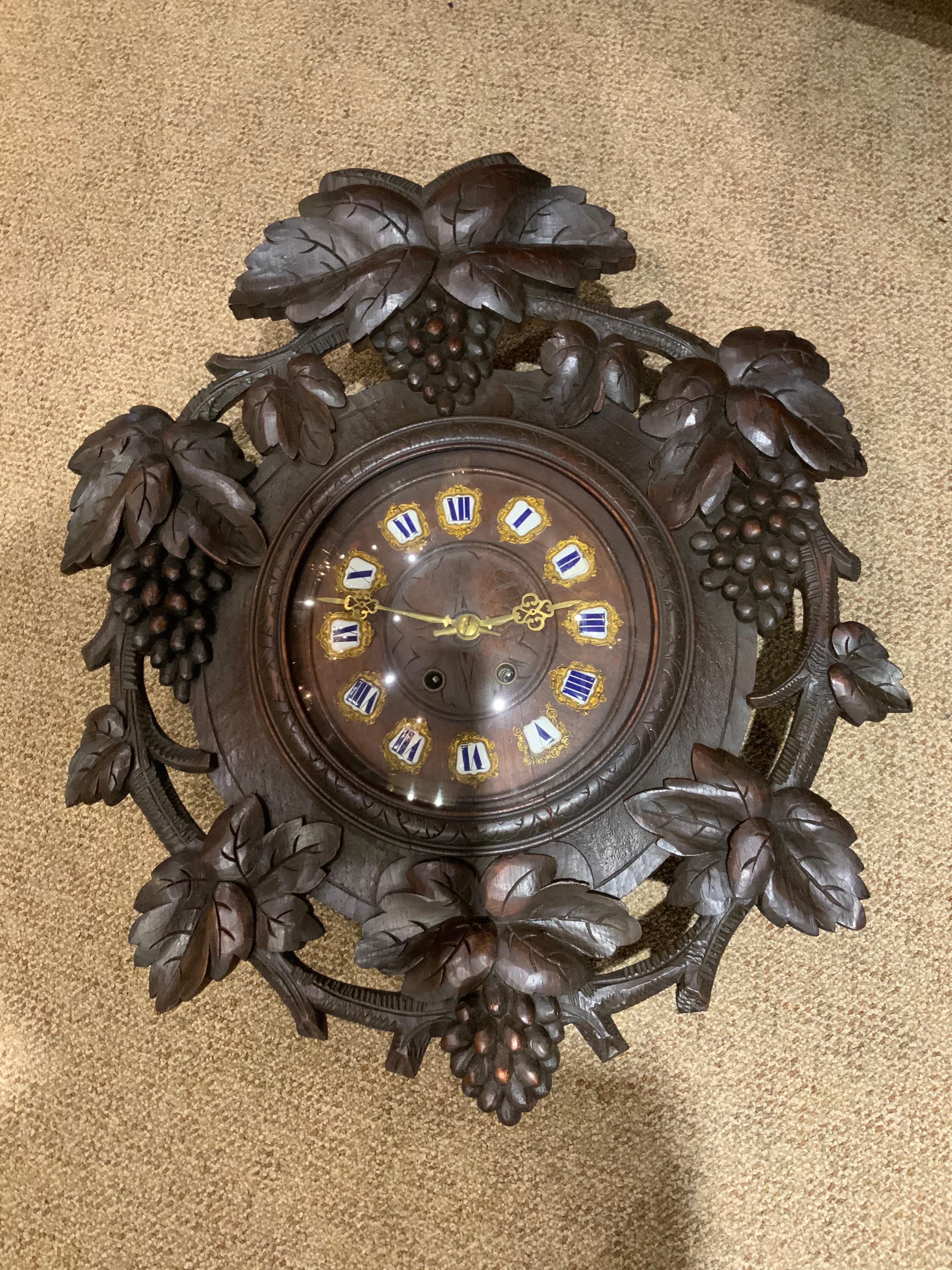 Antique Black Forest hand carved case wall clock In Good Condition For Sale In Houston, TX