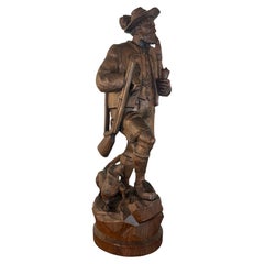 Antike, handgeschnitzte Jägerfigur aus dem Schwarzwald mit Hund, Schweizer Volkskunst, 19. Jahrhundert