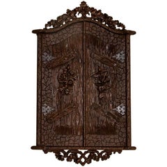 Antique Black Forest Hanging Cabinet with Carved Flowers and Oak Leaves