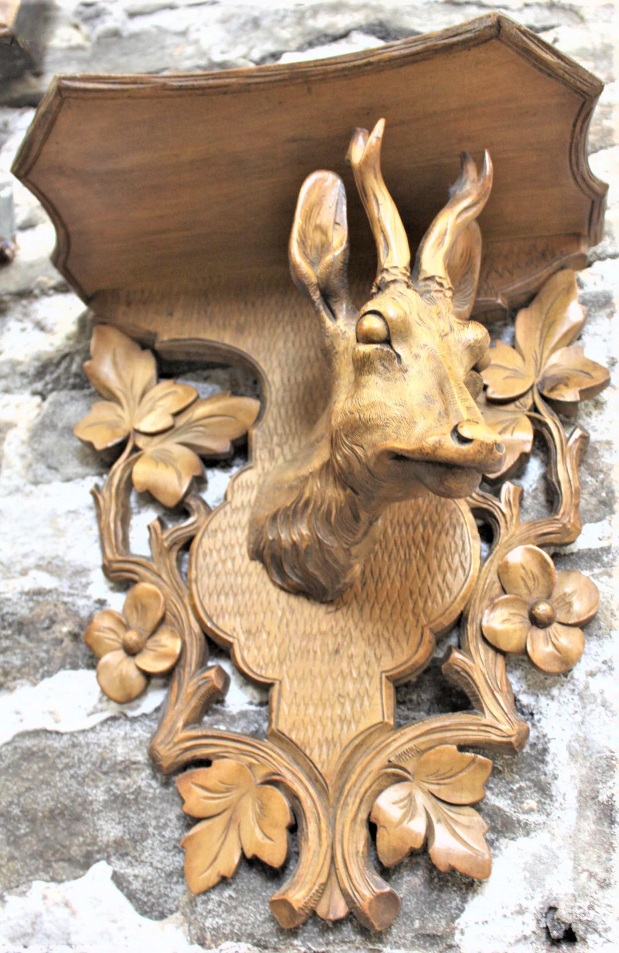 Antique Black Forest Hanging Wall Shelf with Carved Red Deer & Floral Decoration In Good Condition In Hamilton, Ontario