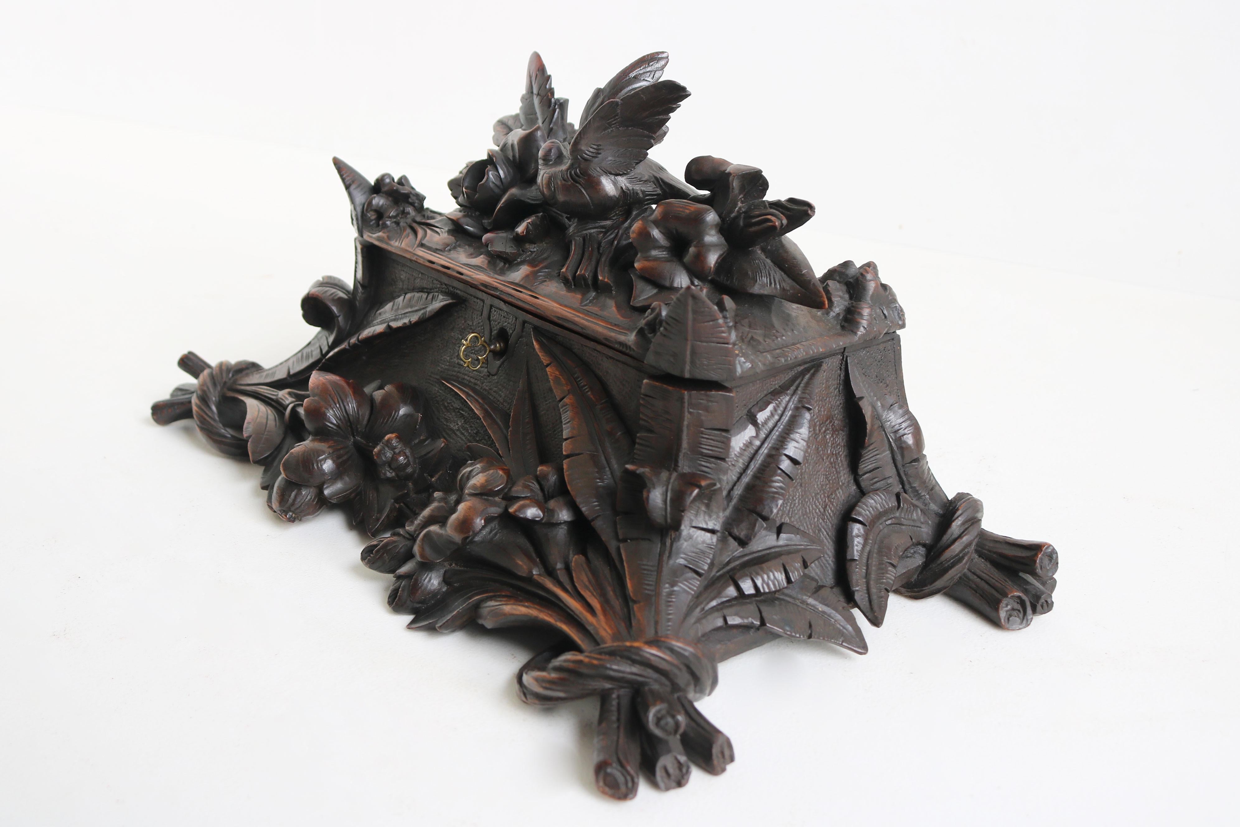 Wood Antique Black forest jewelry carved walnut swiss 19th century Flowers and bird For Sale
