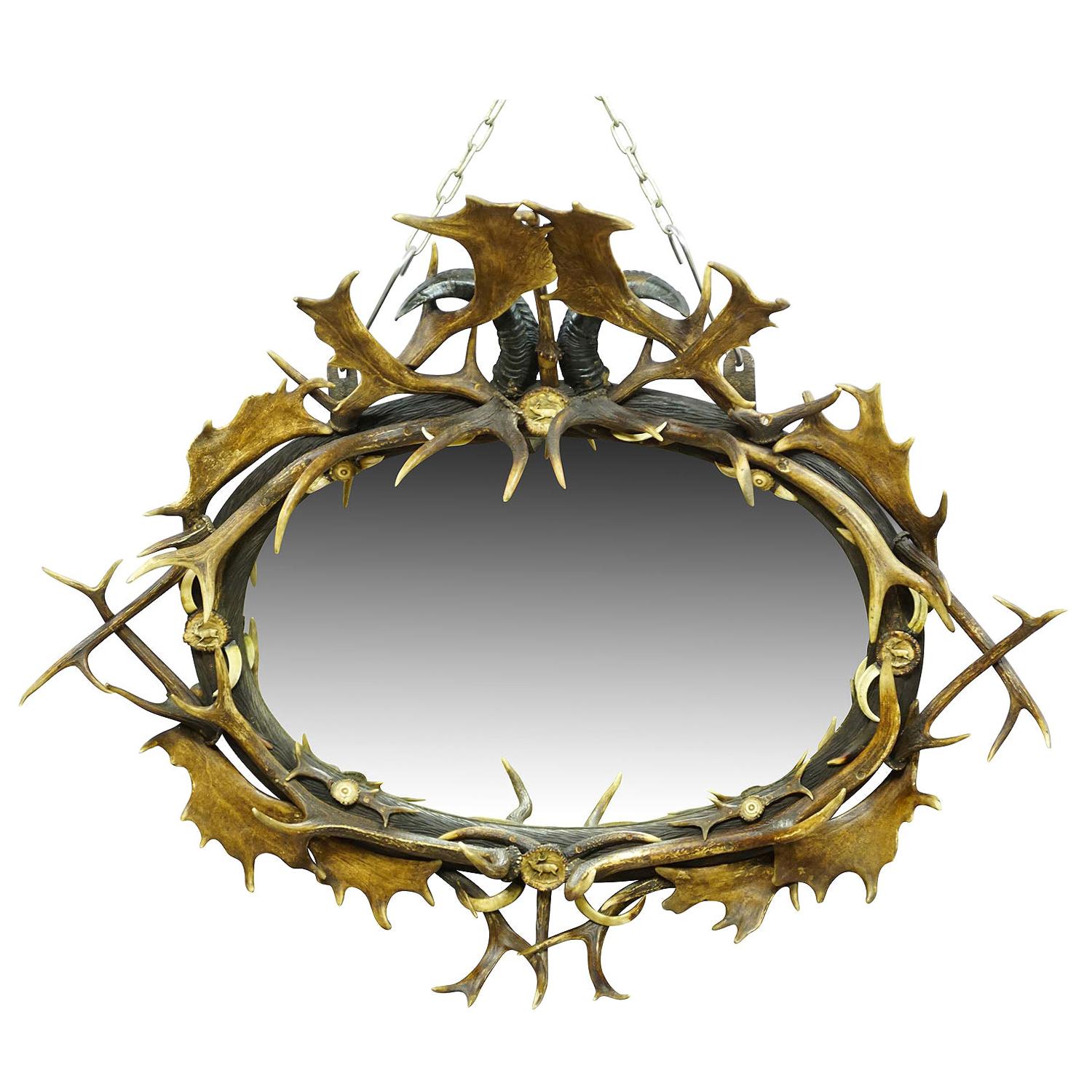 Antique Black Forest Mirror with Rustic Antler Decorations, ca. 1900