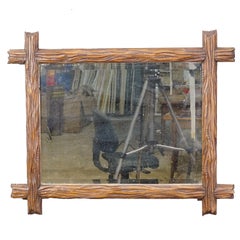 Antique Black Forest Mirror with Rustic Carved Frame