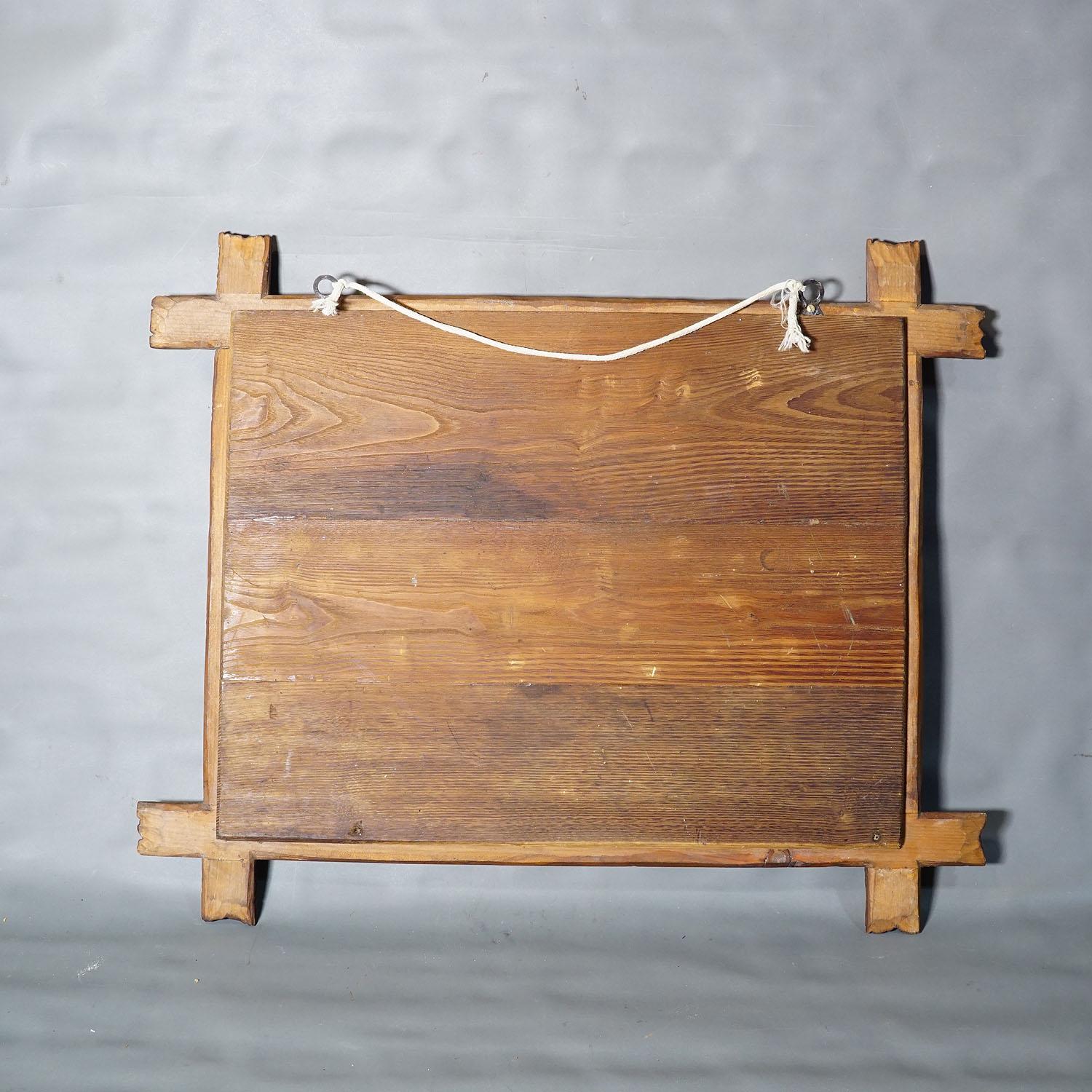 Miroir de forêt noire antique avec cadre sculpté rustique Bon état - En vente à Berghuelen, DE