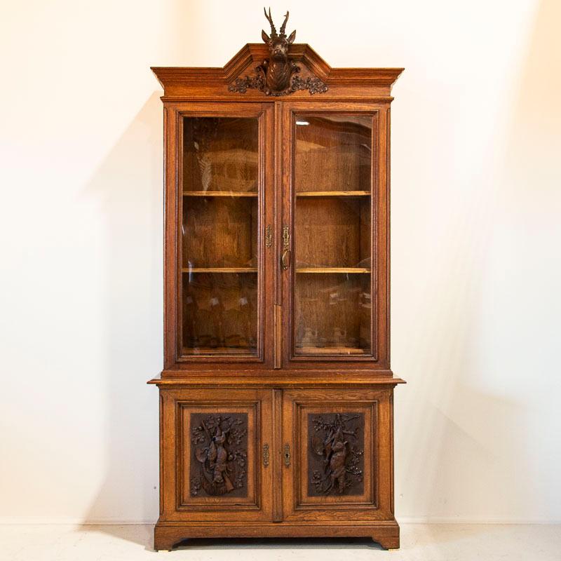 Danish Antique Black Forest Style Gun Cabinet or Bookcase with Carved Deer Head