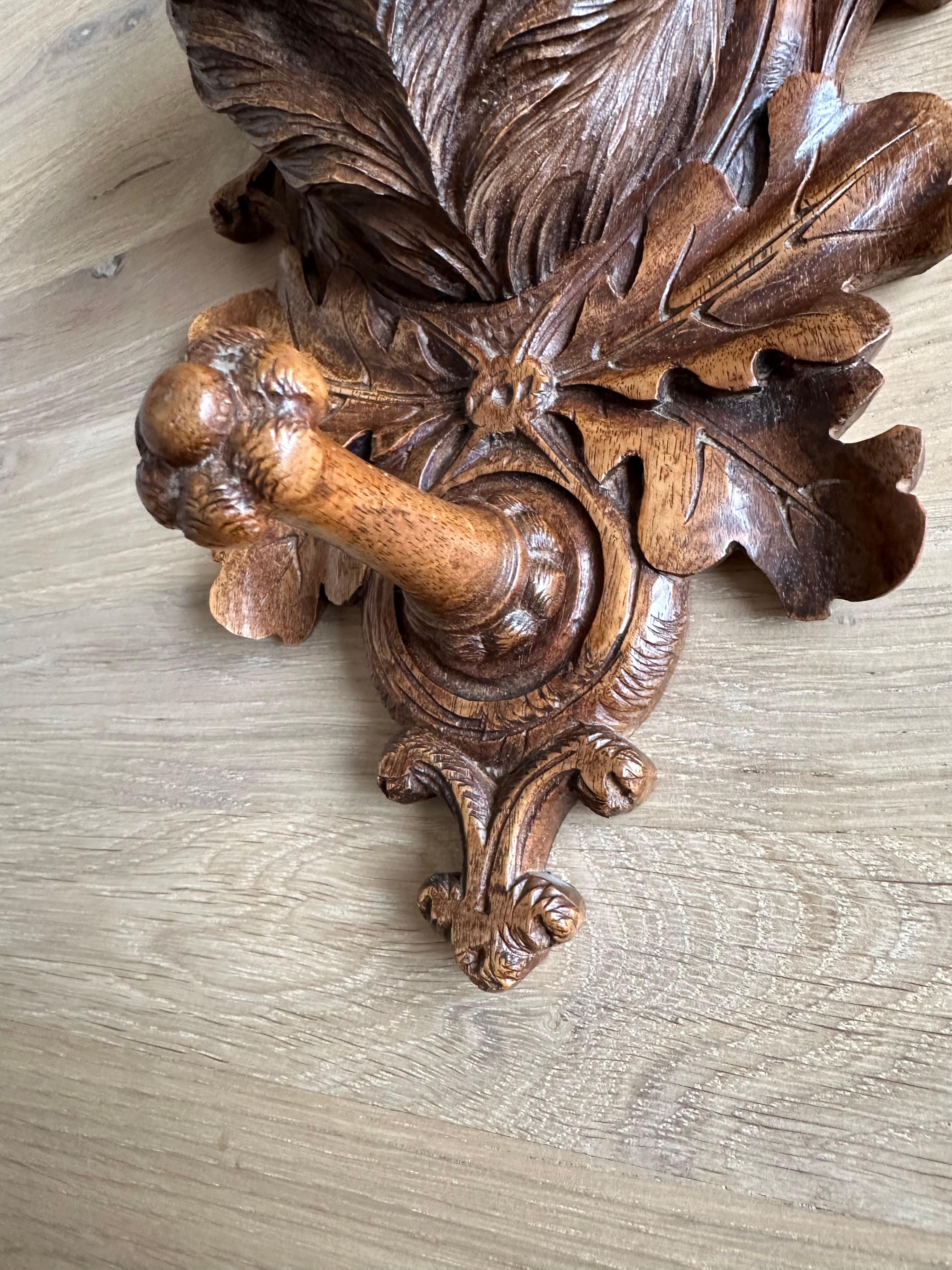 Hand-Crafted Antique Black Forest Wall Coat Rack with Carved Nutwood Lion Sculpture and Hook