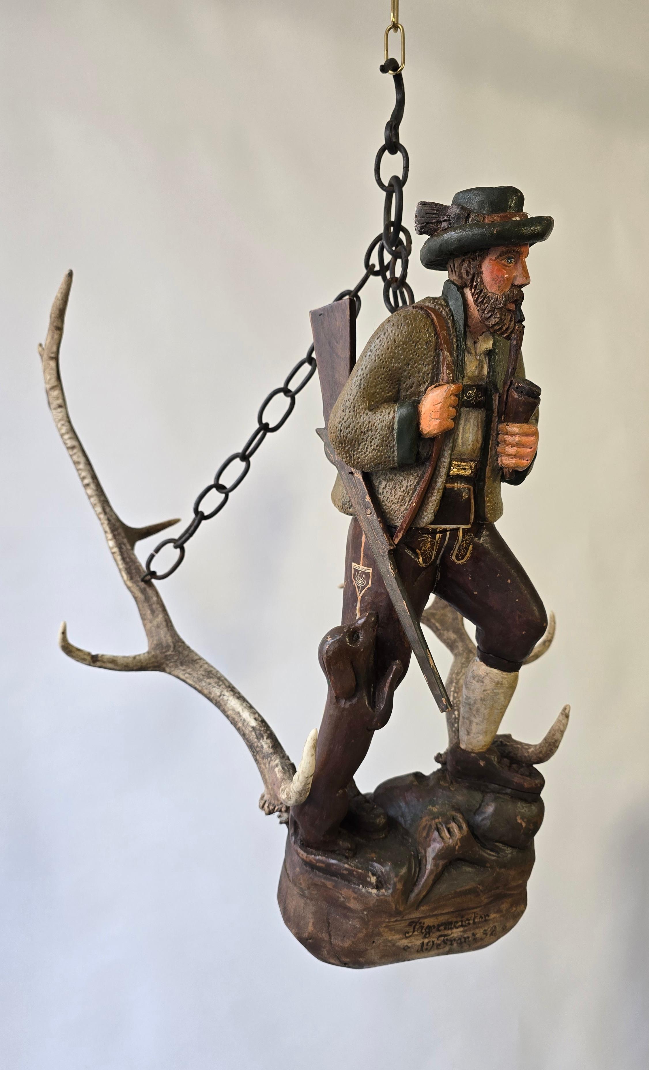 Rustic Antique Black Forest Wood Carving  Hunter Sculpture 1952 For Sale