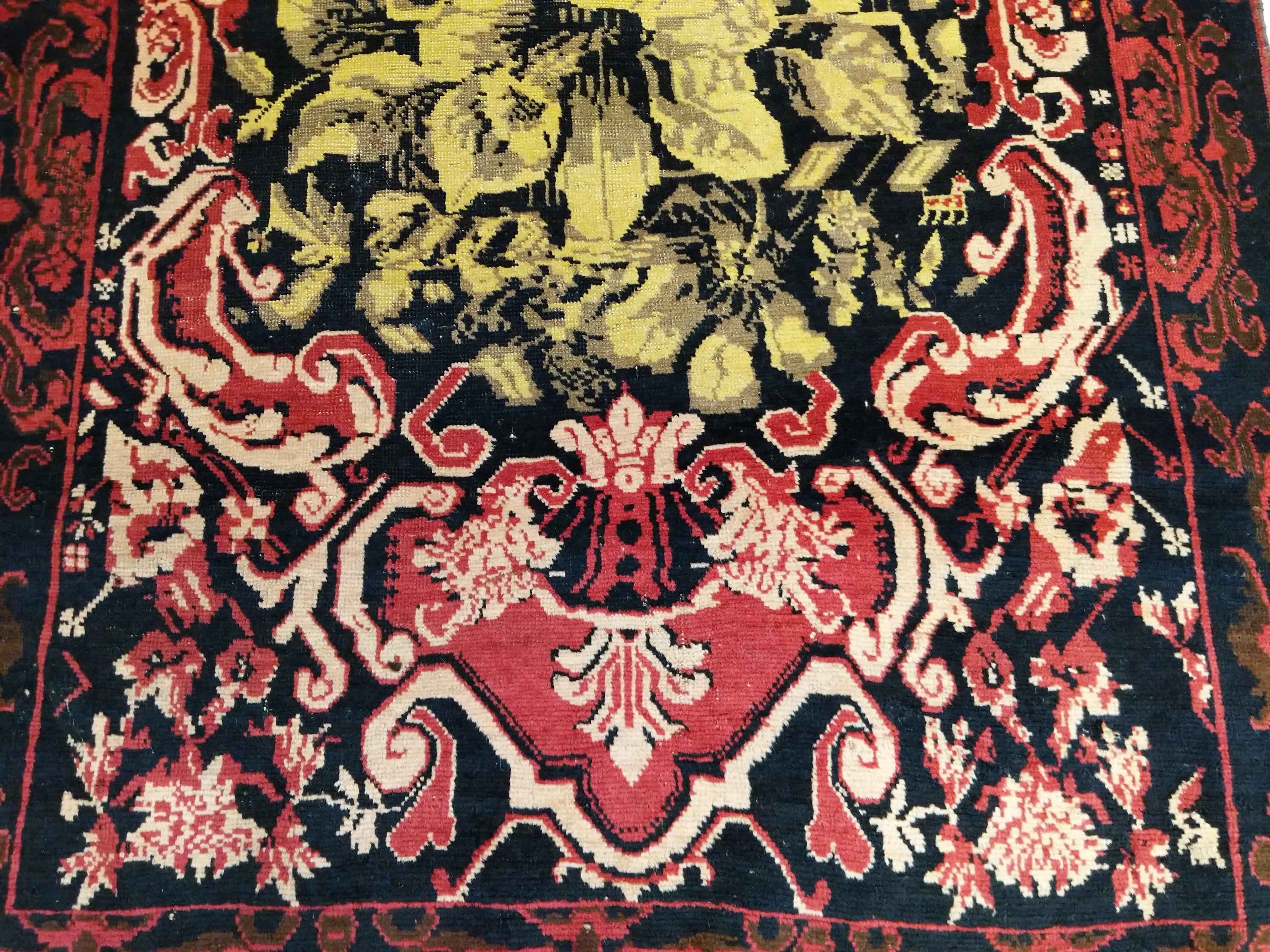 This elegant floral runner belongs to a rare subgroup of early rugs from the Qarabagh Khanate, ornated by motifs inspired by French Savonnerie and Aubusson carpets. During the nineteenth century rugs such as this one were commissioned by the Russian