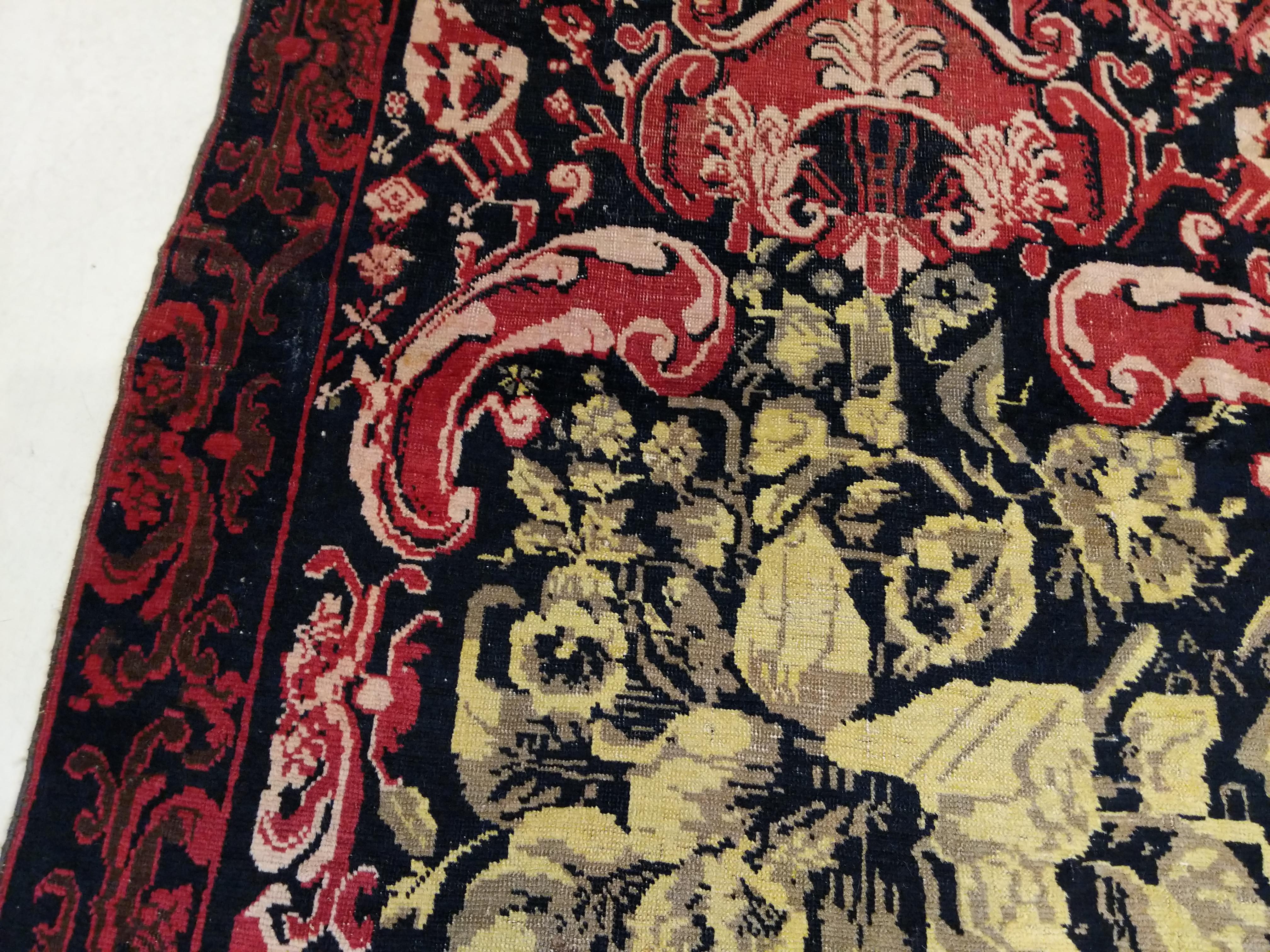 Caucasian Antique Black Ground Qarabagh Blossom Long Rug in the St. Petersburg Style For Sale