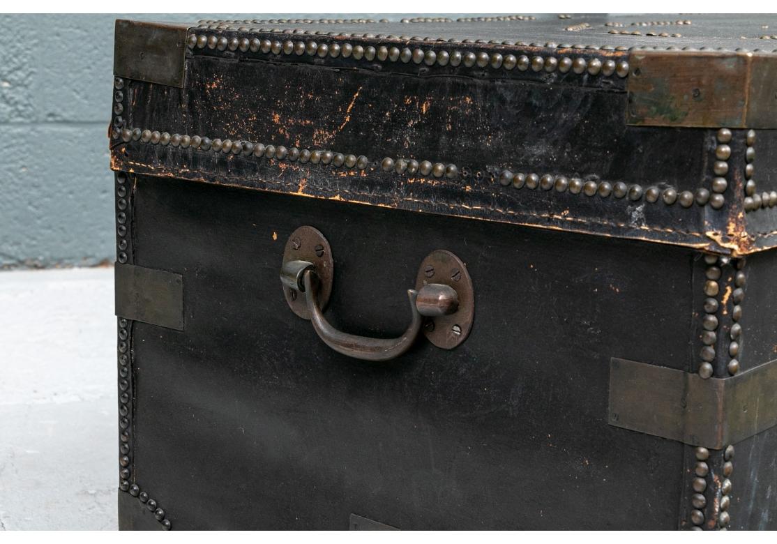 Antique Black Leather Campaign Trunk as Cocktail Table 5