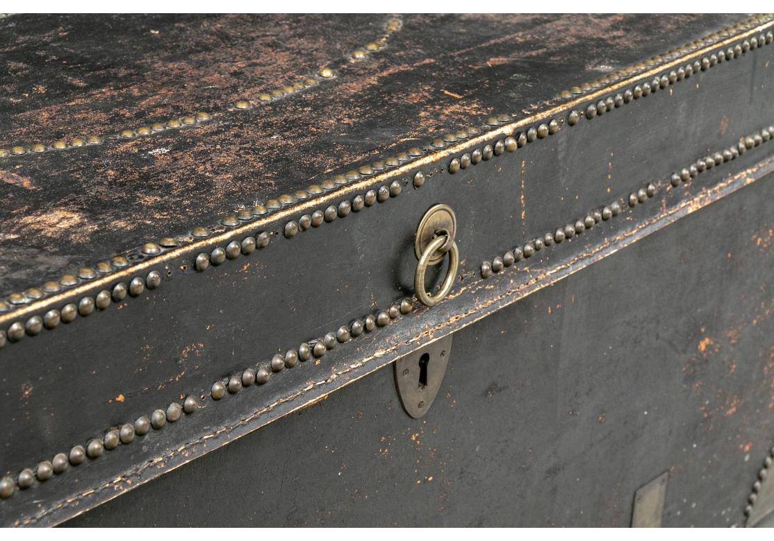 English Antique Black Leather Campaign Trunk as Cocktail Table