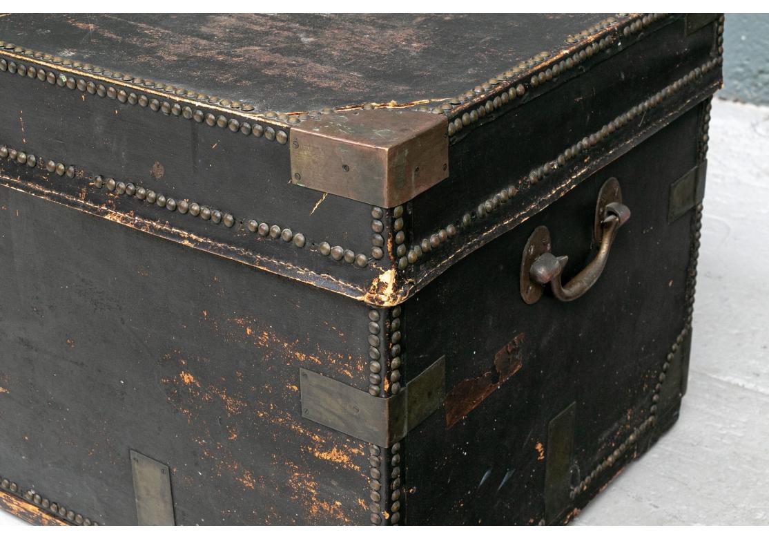Antique Black Leather Campaign Trunk as Cocktail Table In Good Condition In Bridgeport, CT