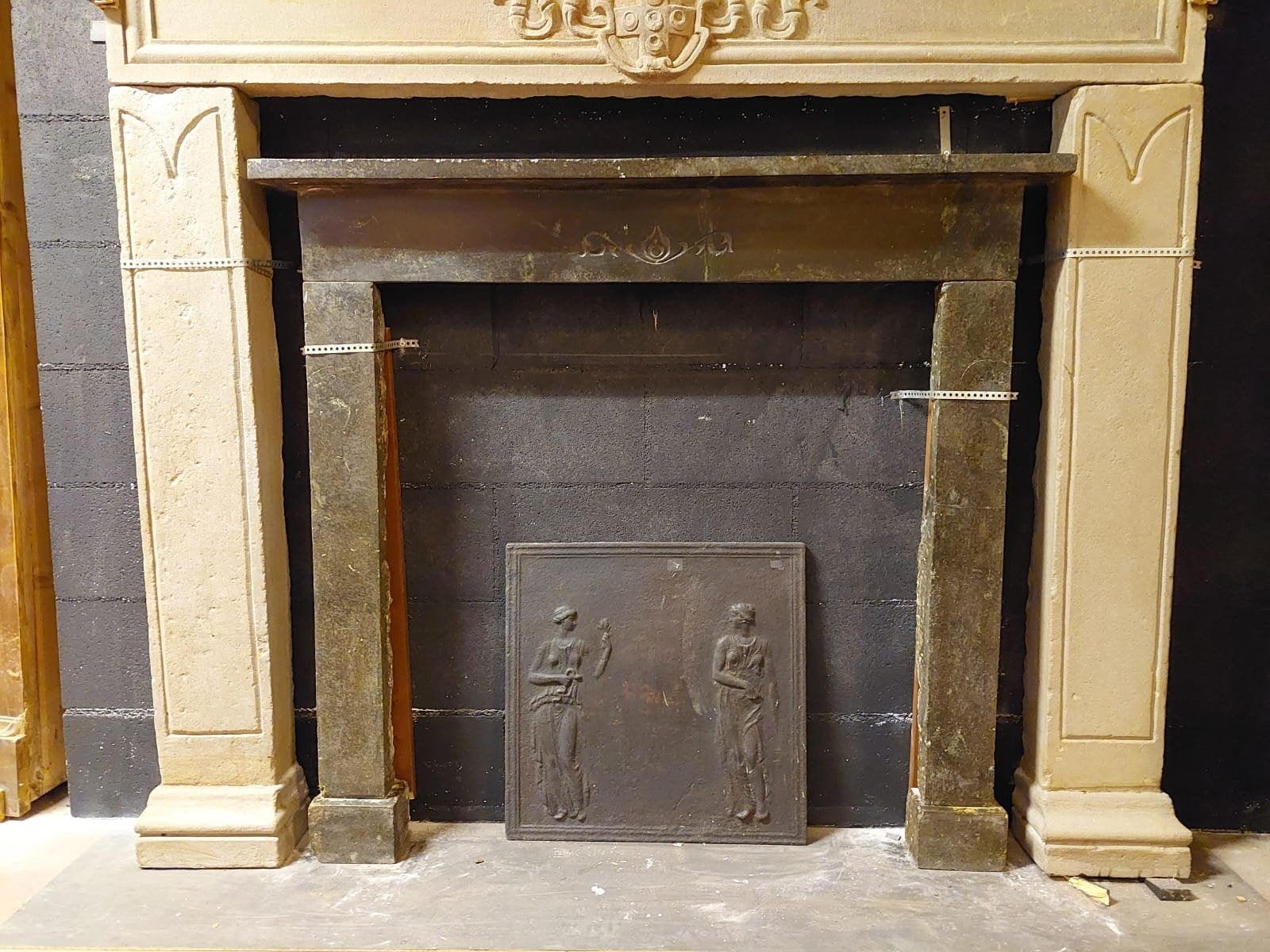 Italian Antique Black Marble Fireplace Mantle with Central Carving, 19th Century Italy For Sale