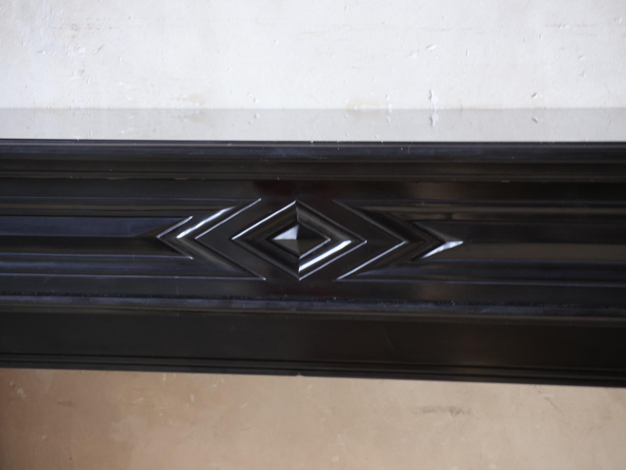 Antique black marble Modillion mantelpiece In Good Condition For Sale In Baambrugge, NL