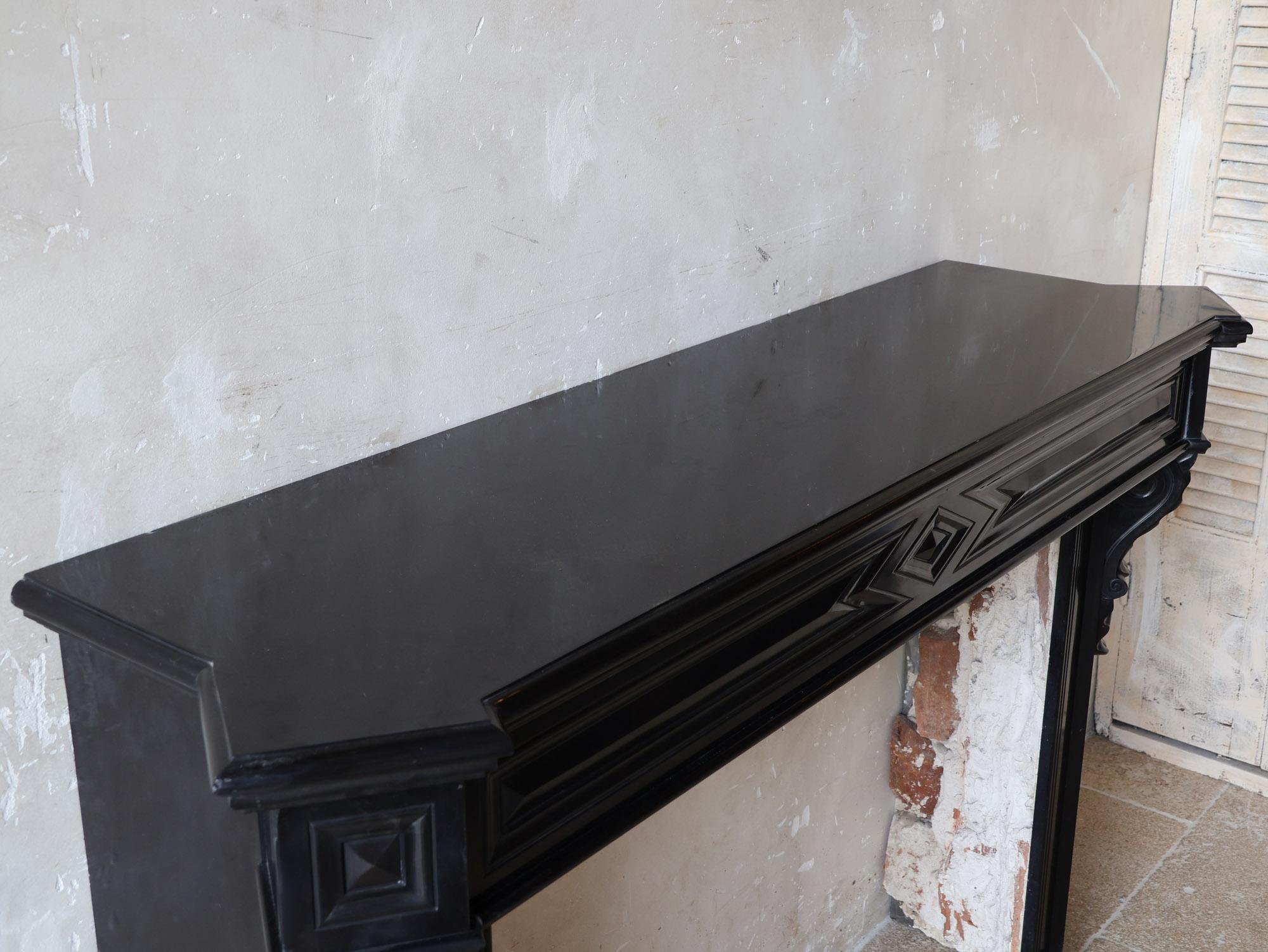 Antique black marble Modillion mantelpiece For Sale 2