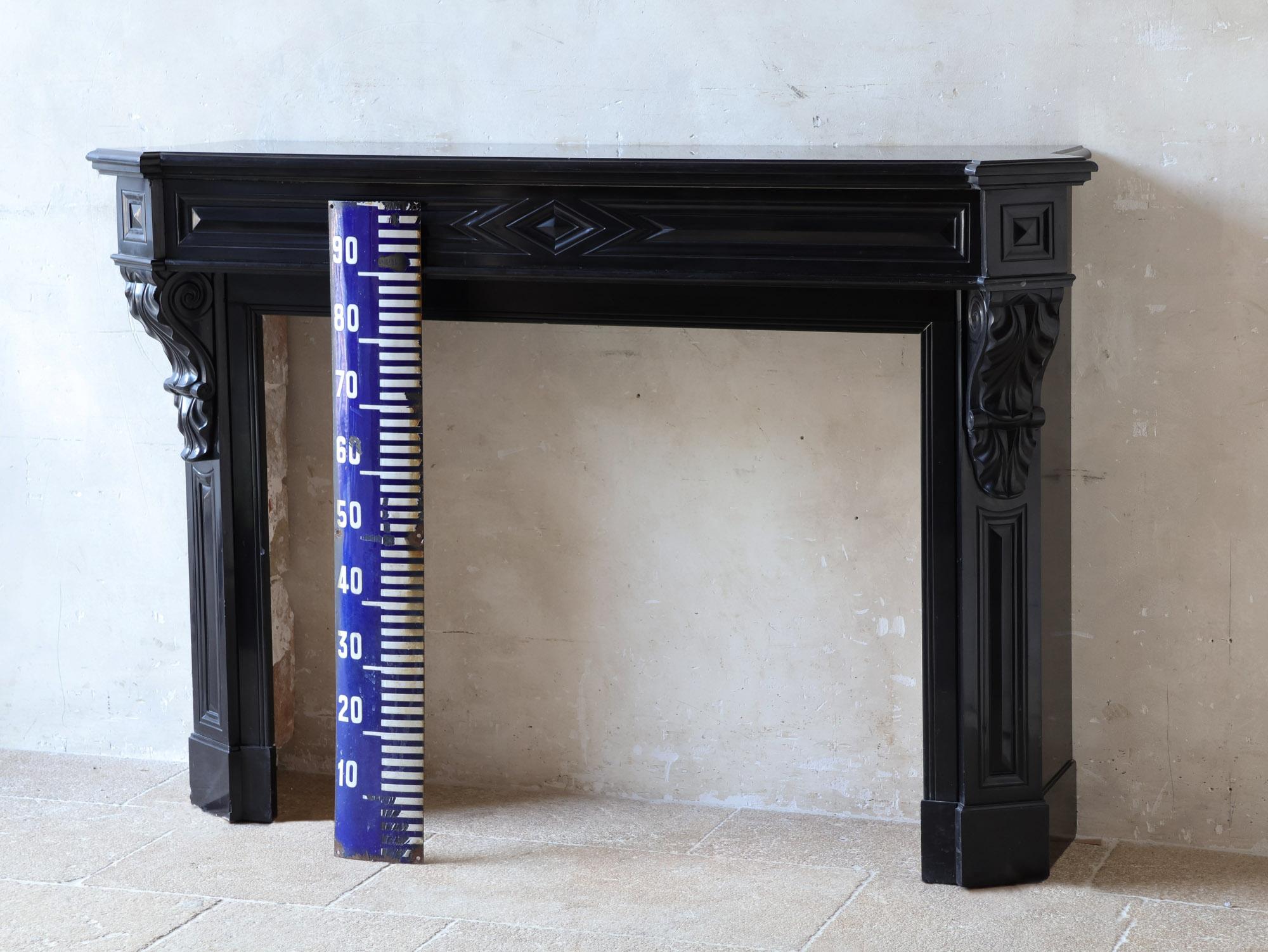 Antique black marble Modillion mantelpiece For Sale 3