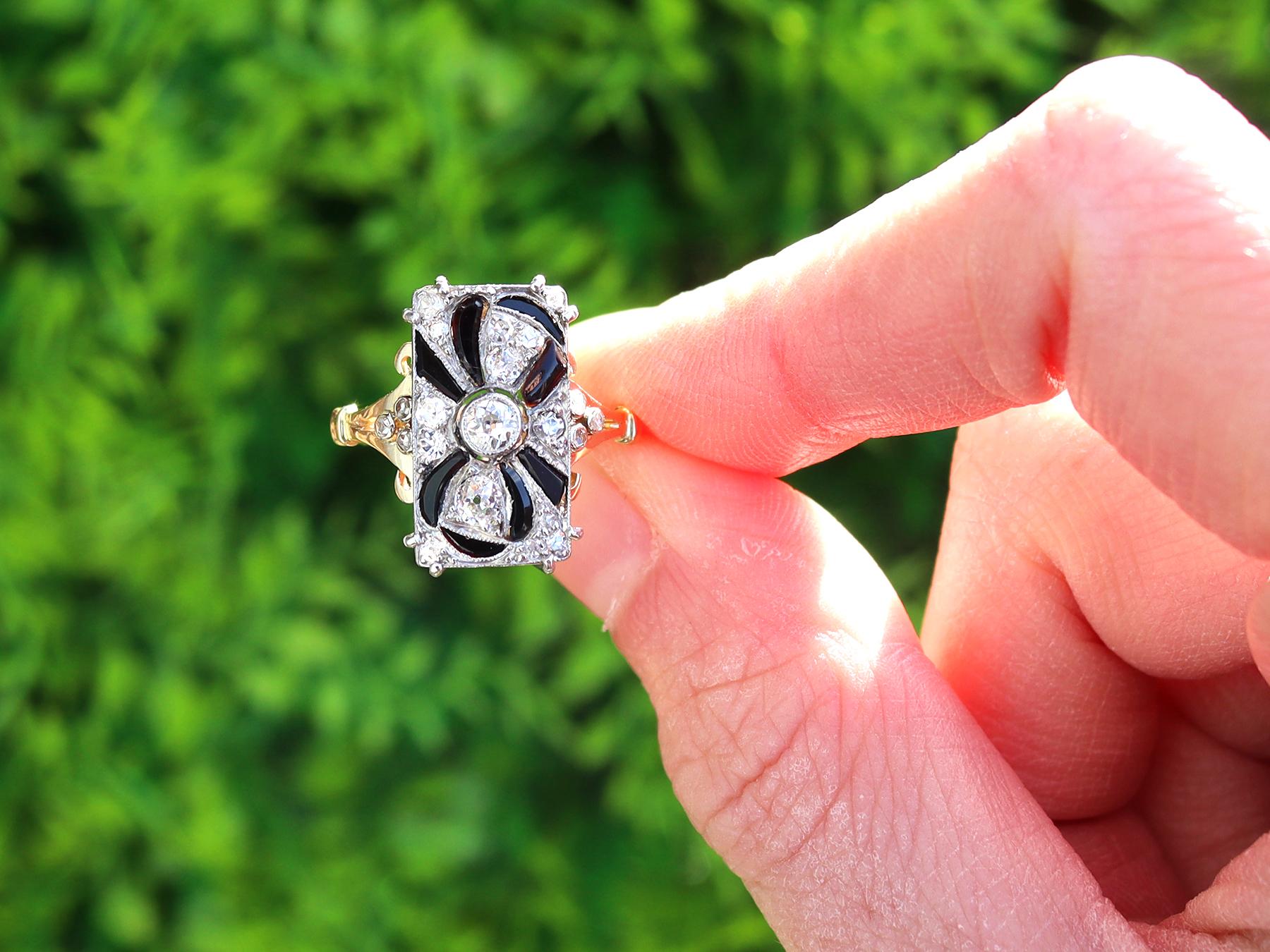 A stunning, fine and impressive antique 0.80 carat black onyx and 0.46 carat diamond, 18 karat yellow gold and platinum set Art Deco dress ring; part of our diverse antique jewellery and estate jewelry collections.

This stunning, fine and