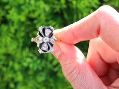 Antique Black Onyx and 0.46 Carat Diamond 18 Karat Yellow Gold Ring