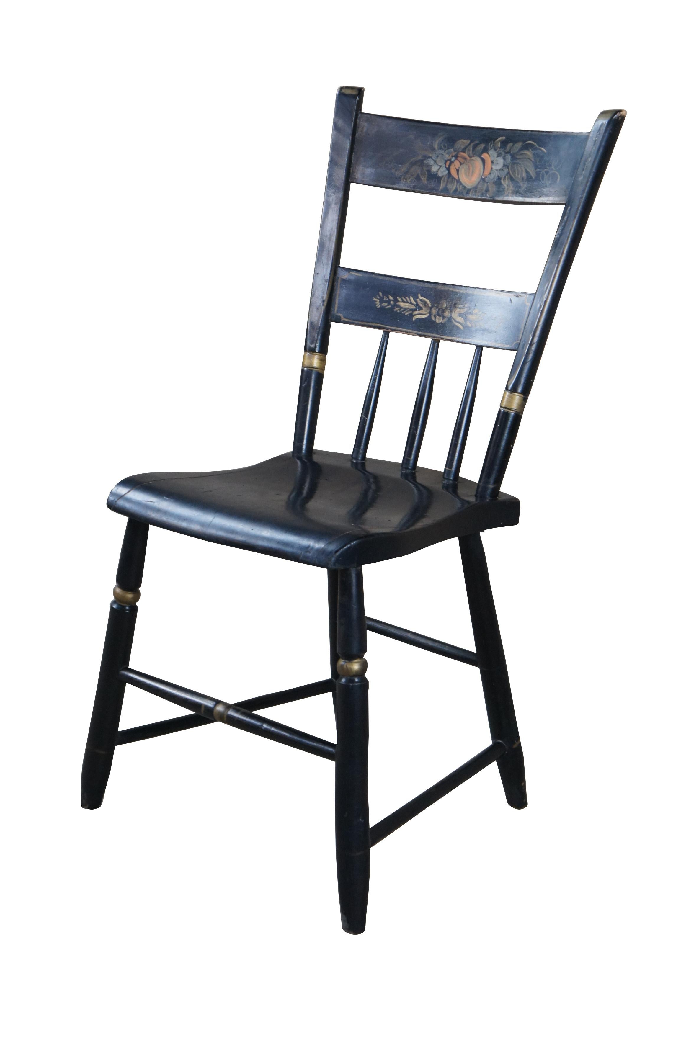 Antique primitive Hitchcock style plank seat Windsor chair featuring black stenciled fruit design with gold accents.