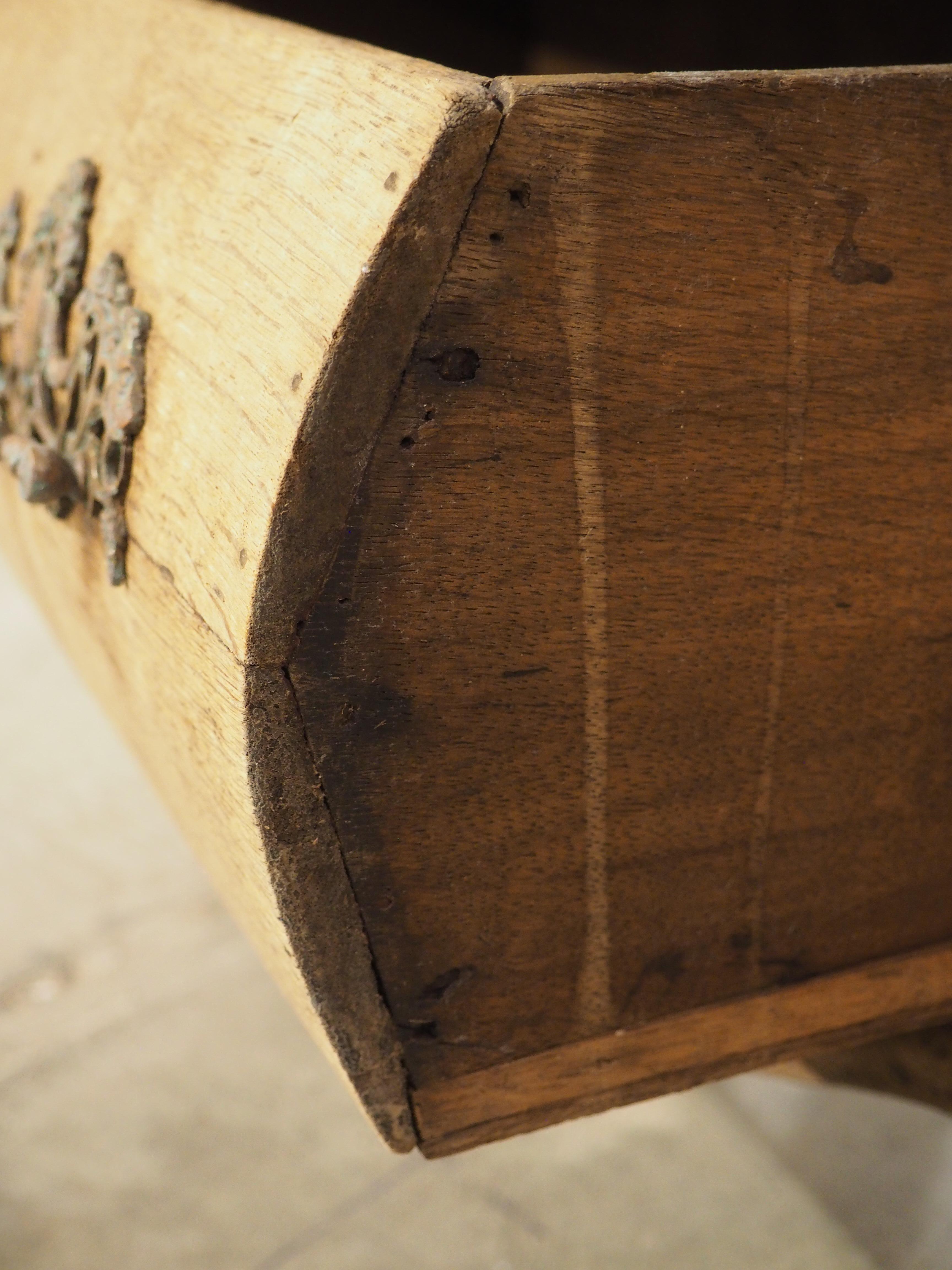 More information coming soon…

Hand-carved circa 1850, the form of this bleached drop front secretary commode is distinctly Dutch (more specifically from what used to be Holland).  The undulating and protruding sides sit atop wonderfully carved paw