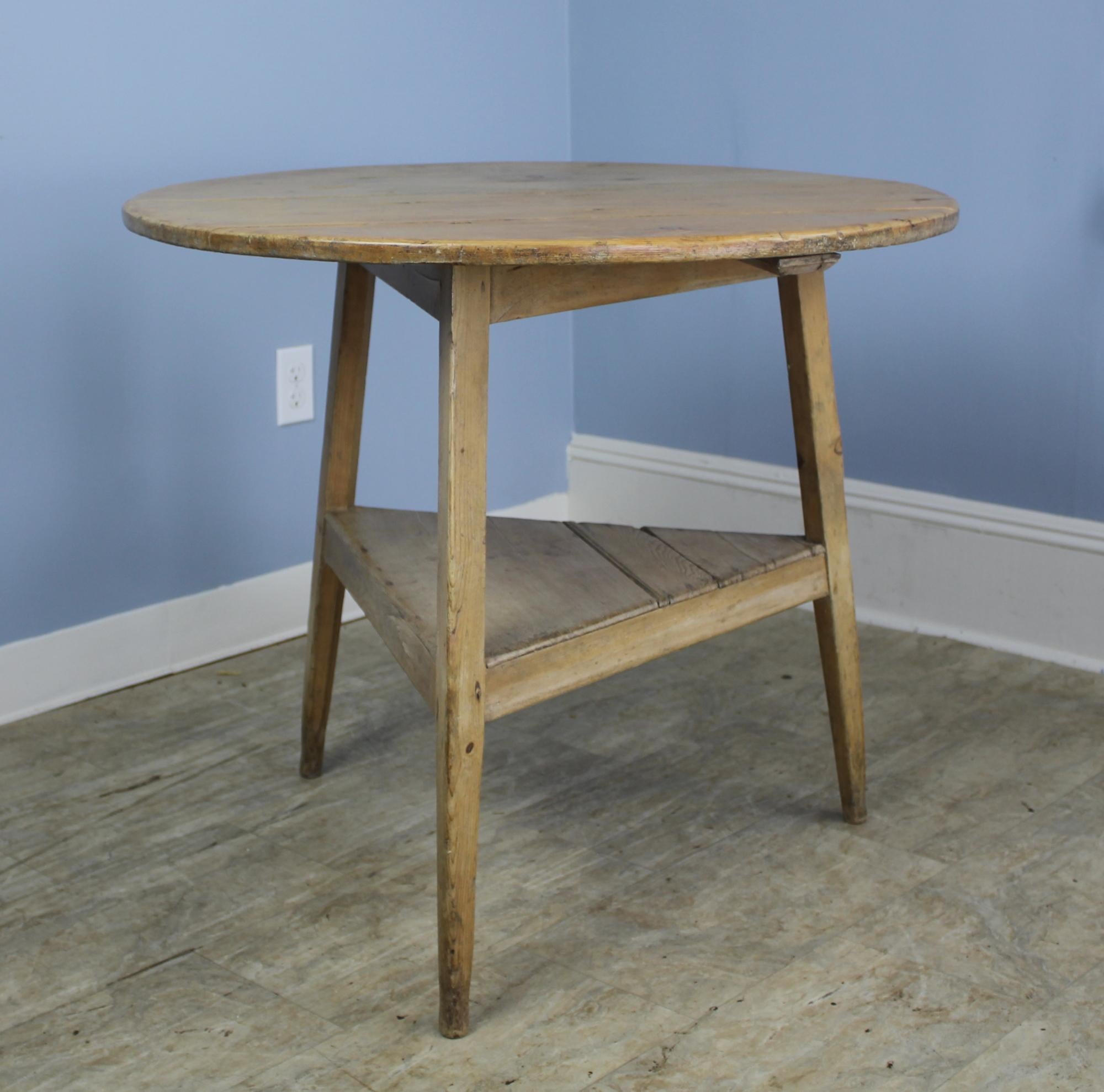 Very charming Welsh cricket table, Very good height for a side or end table, and also for a lamp table. A great antique country look, with very lovely modern bleached look.