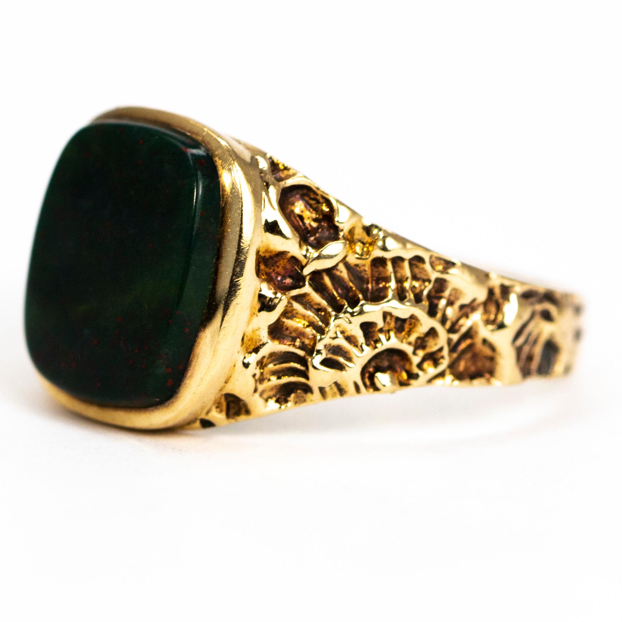 Has you ever seen such fancy shoulders!? They are beautifully engraved with a simple floral design which is so effective with the chunky style of the ring. The bloodstone is a squoval shape and is so gorgeously glossy. Made in London, England.