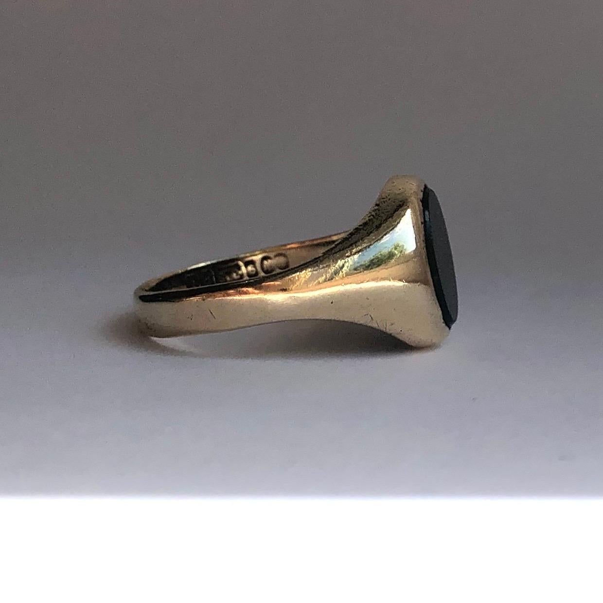 This classic style bloodstone signet ring is modelled out of smooth 9ct gold. The stone is set within the ring and is lovely and glossy. Made in Birmingham, England. 

Ring Size: O 1/2 or 7 1/2
Stone Dimensions: 10x8mm

Weight: 3g
