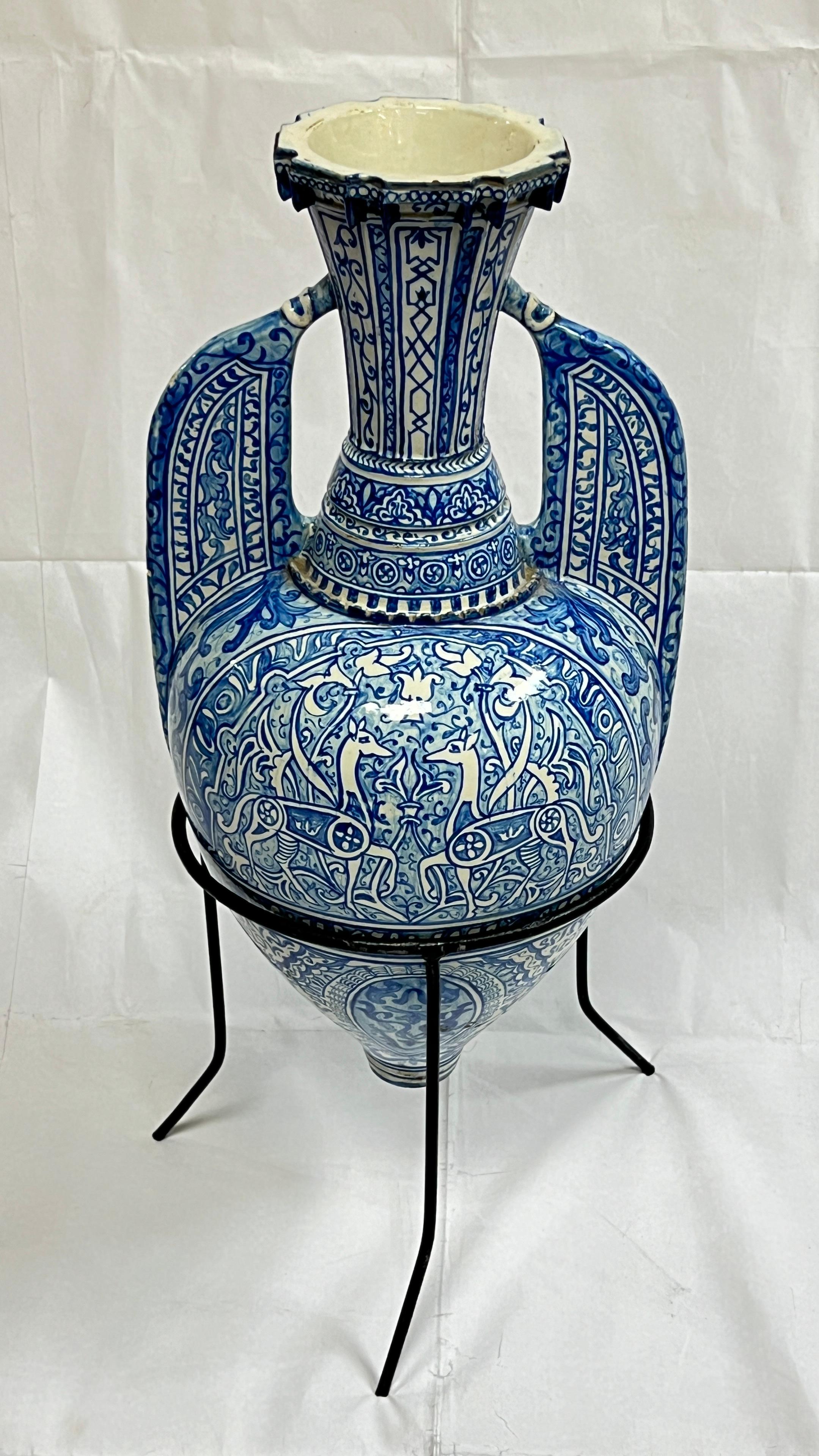 Glazed Antique Blue and White Ceramic Alhambra Vase and Iron Stand For Sale