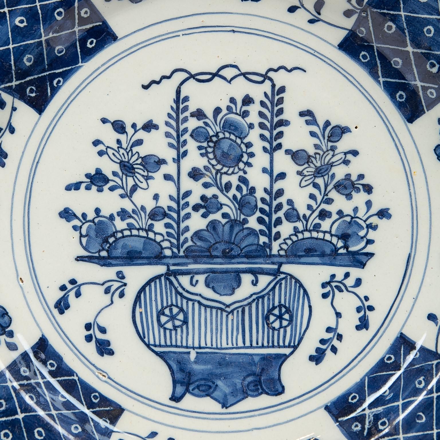 Pareja de antiguos cargadores de Delft azules y blancos fabricados por 