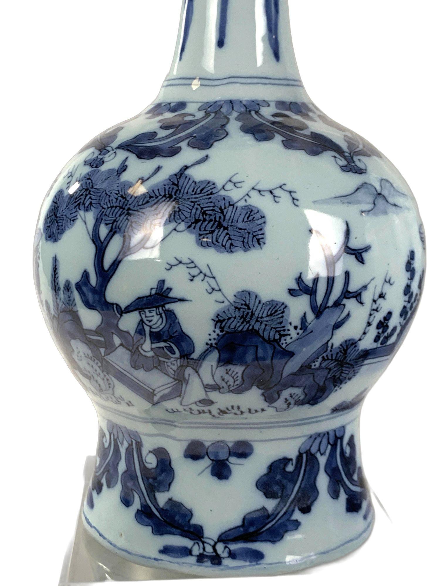 This exquisite blue and white Dutch Delft vase was crafted in the late 17th century.
Its excellent chinoiserie decoration epitomizes 17th-century Europe's fascination with Chinese porcelain.
The vase's design features delicate hand-painted scenes in