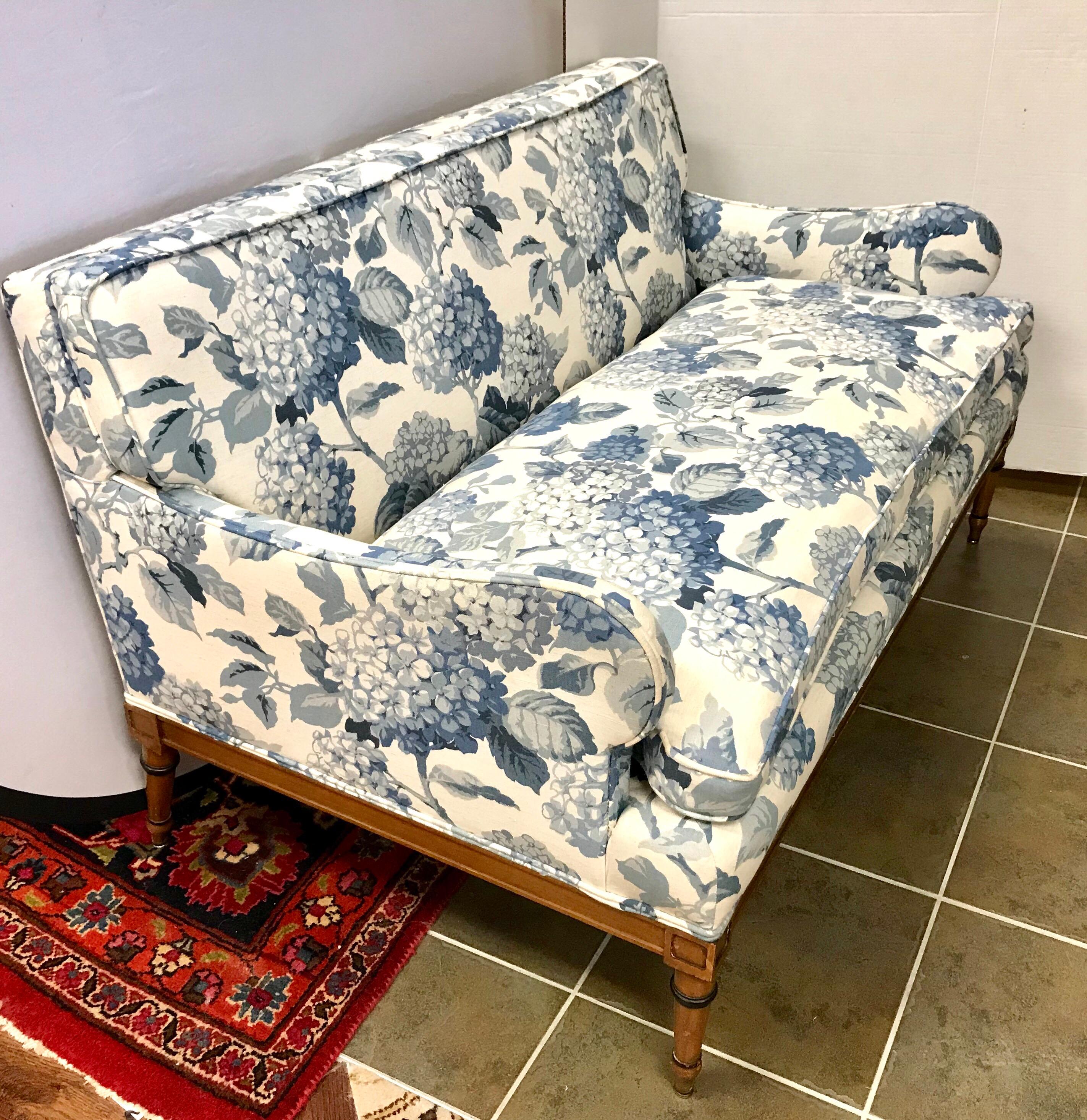blue and white loveseat
