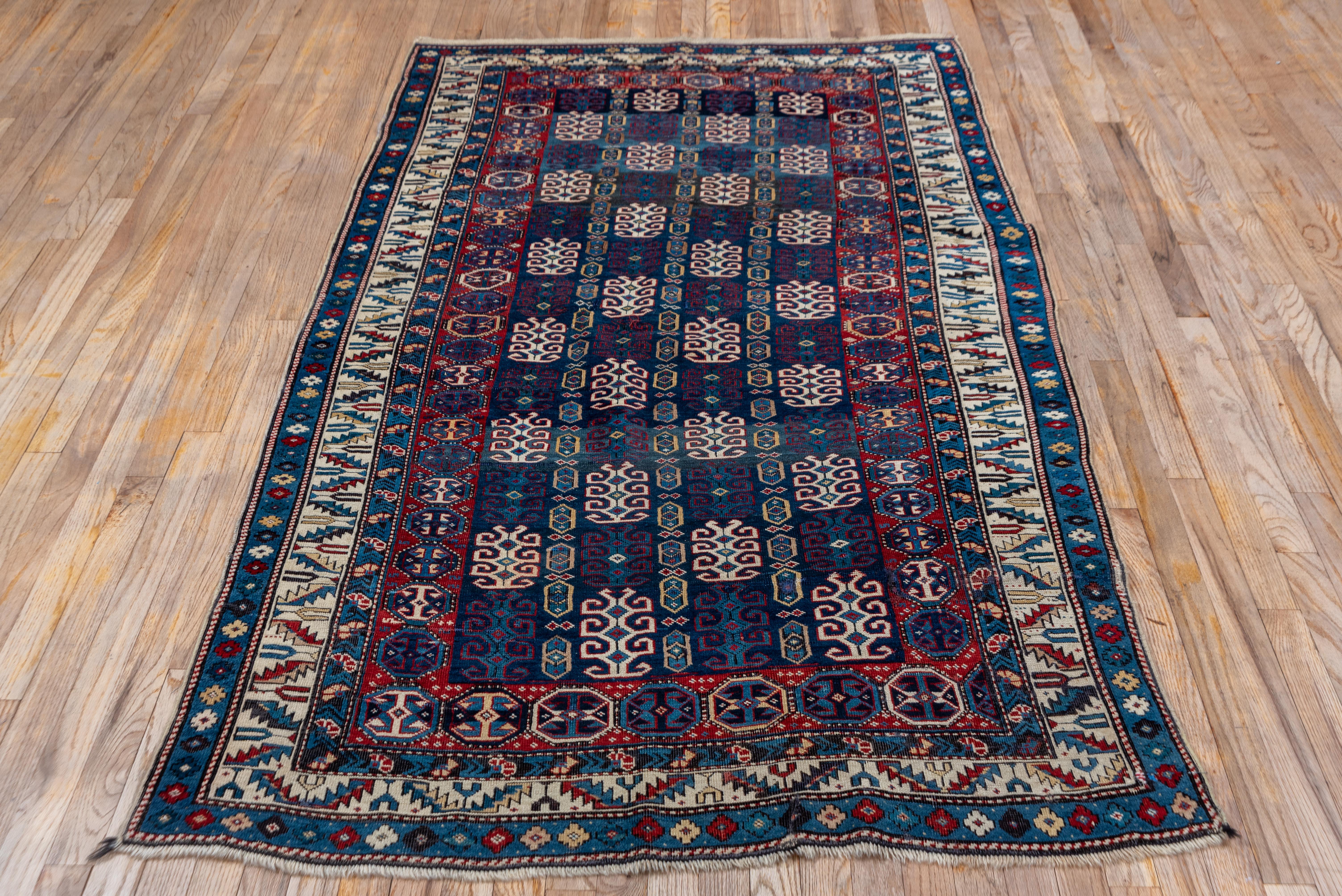 Hand-Knotted Antique Blue Caucasian Kuba Rug, Allover Field, circa 1900s For Sale