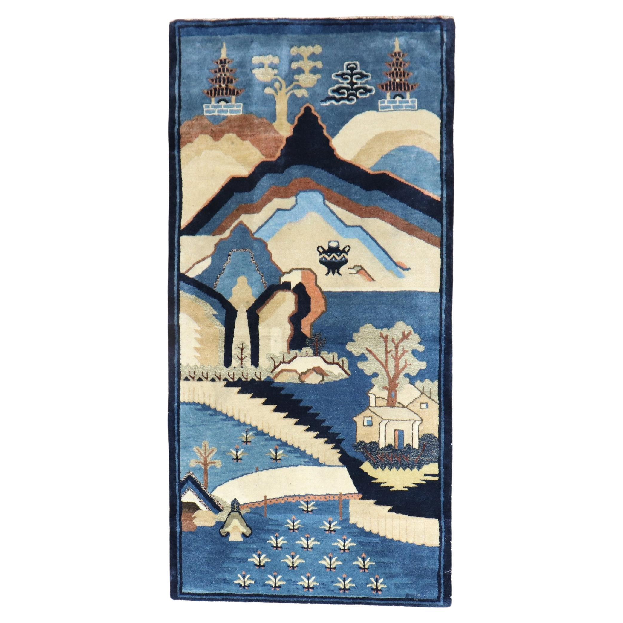 Tapis chinois ancien bleu à motifs picturaux