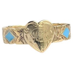 Bague ancienne à anneau en or 9 et émail bleu