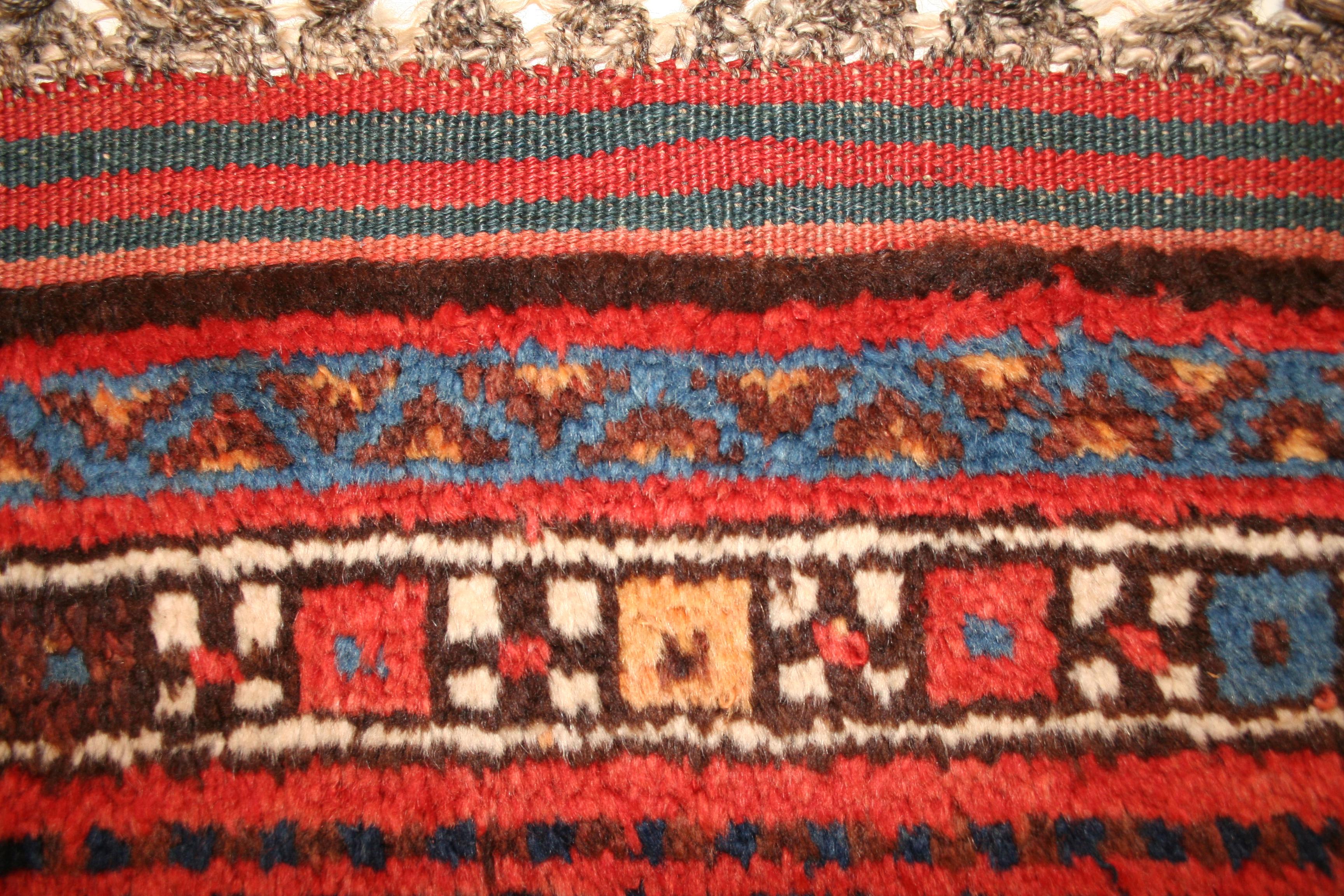 Antique Blue Ground Kurdish Kazak Rug with Wide Geometric Border In Excellent Condition For Sale In Milan, IT