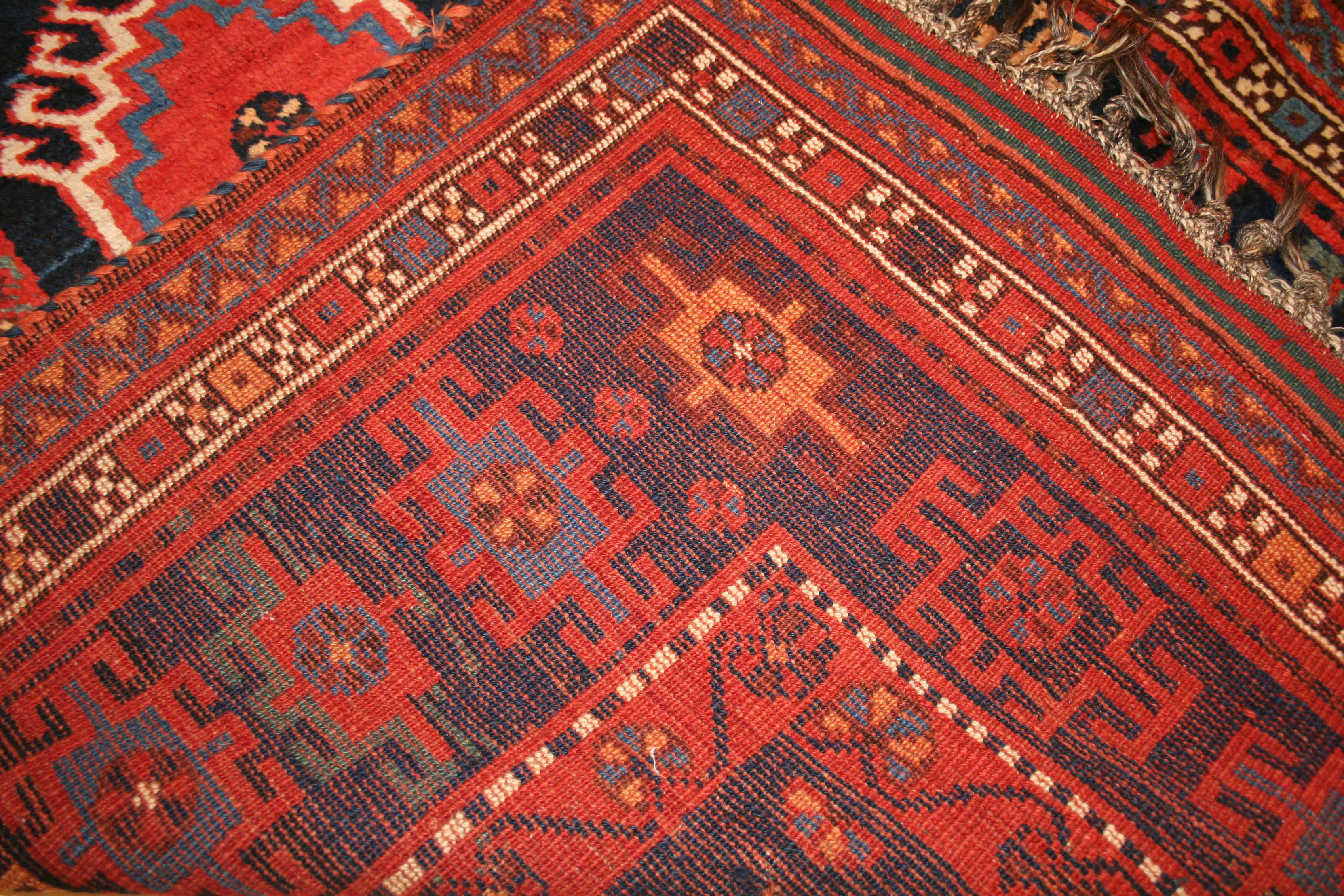 20th Century Antique Blue Ground Kurdish Kazak Rug with Wide Geometric Border For Sale