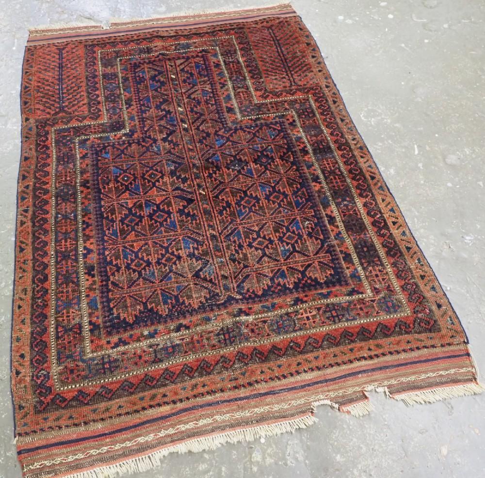 Antique Timuri / Baluch blue ground prayer rug with 'tree of life' design, from Western Afghanistan
Circa 1880 or earlier

A good blue ground Timuri / Baluch prayer rug with tree of life design to the field The hand placements also contain a tree