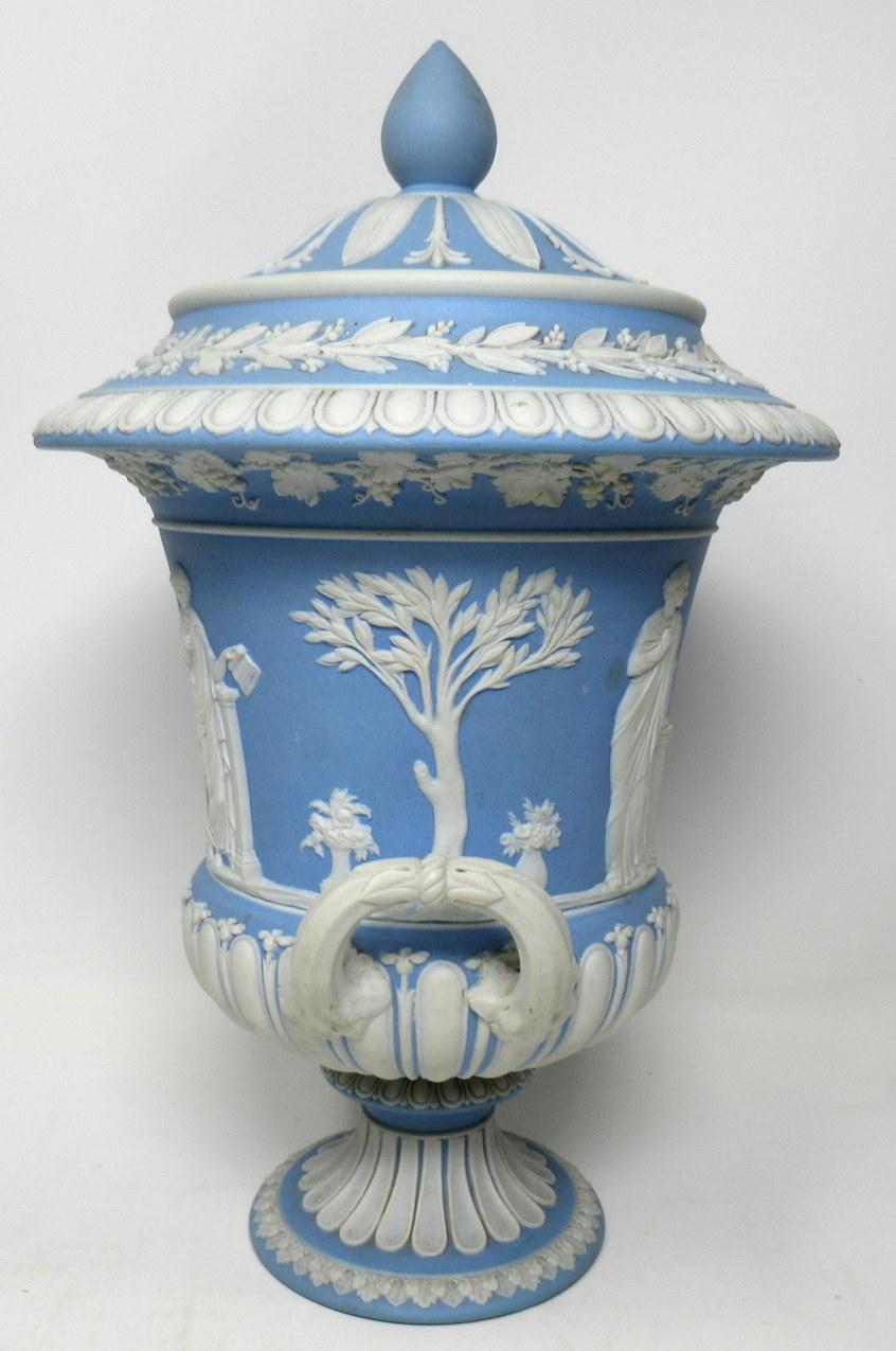 An exceptionally fine quality single English Wedgwood Jasperware urn vase in the neoclassical style, of generous proportions, late nineteenth, early 20th century.

The main outer body in traditional powder blue with applied mythological neoclassical