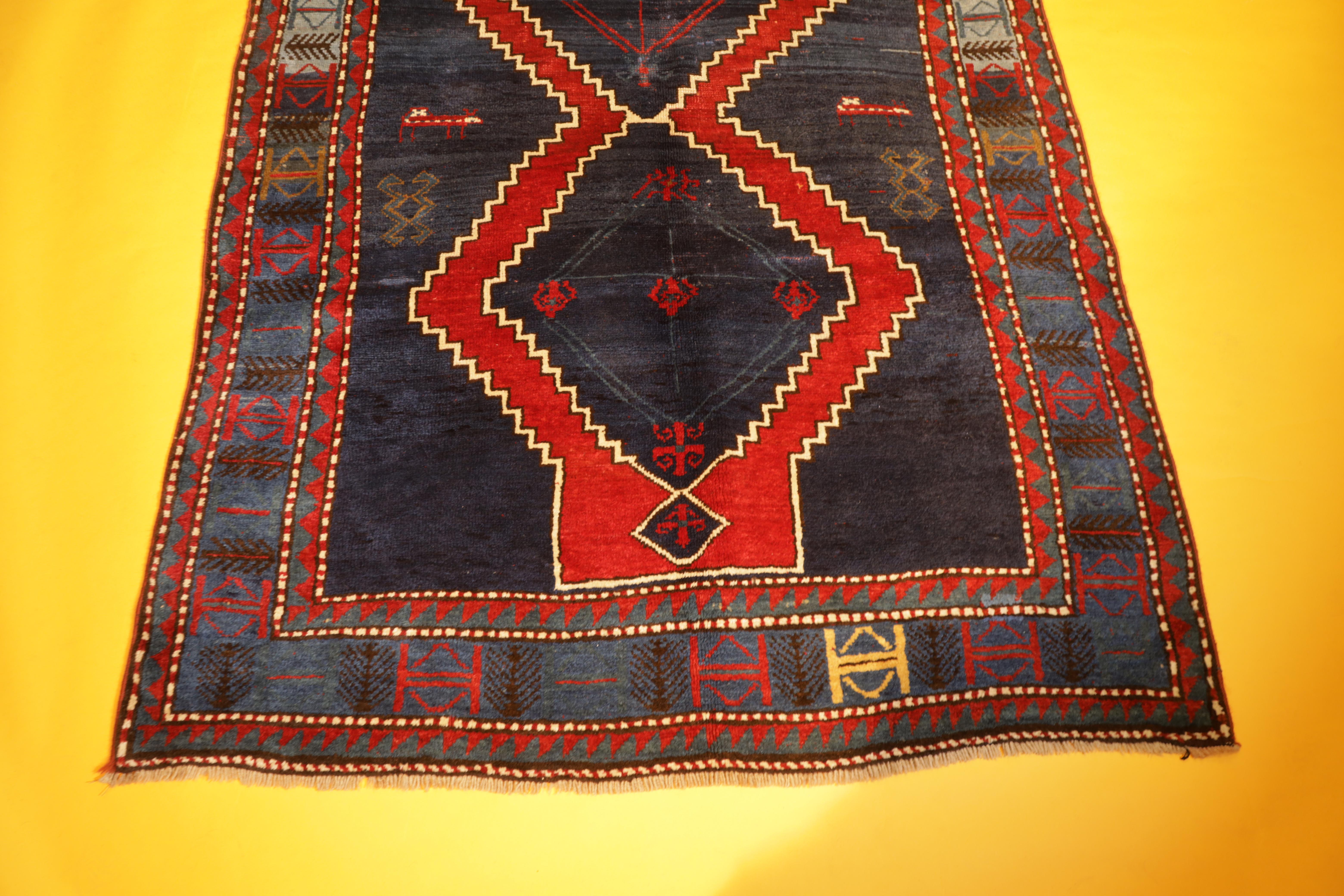 Kazak rugs have primarily been produced as village productions rather than city pieces. Made from materials particular to individual tribal provinces and the rugs of the Caucasus typically display bold geometric designs in primary colours. Kazak