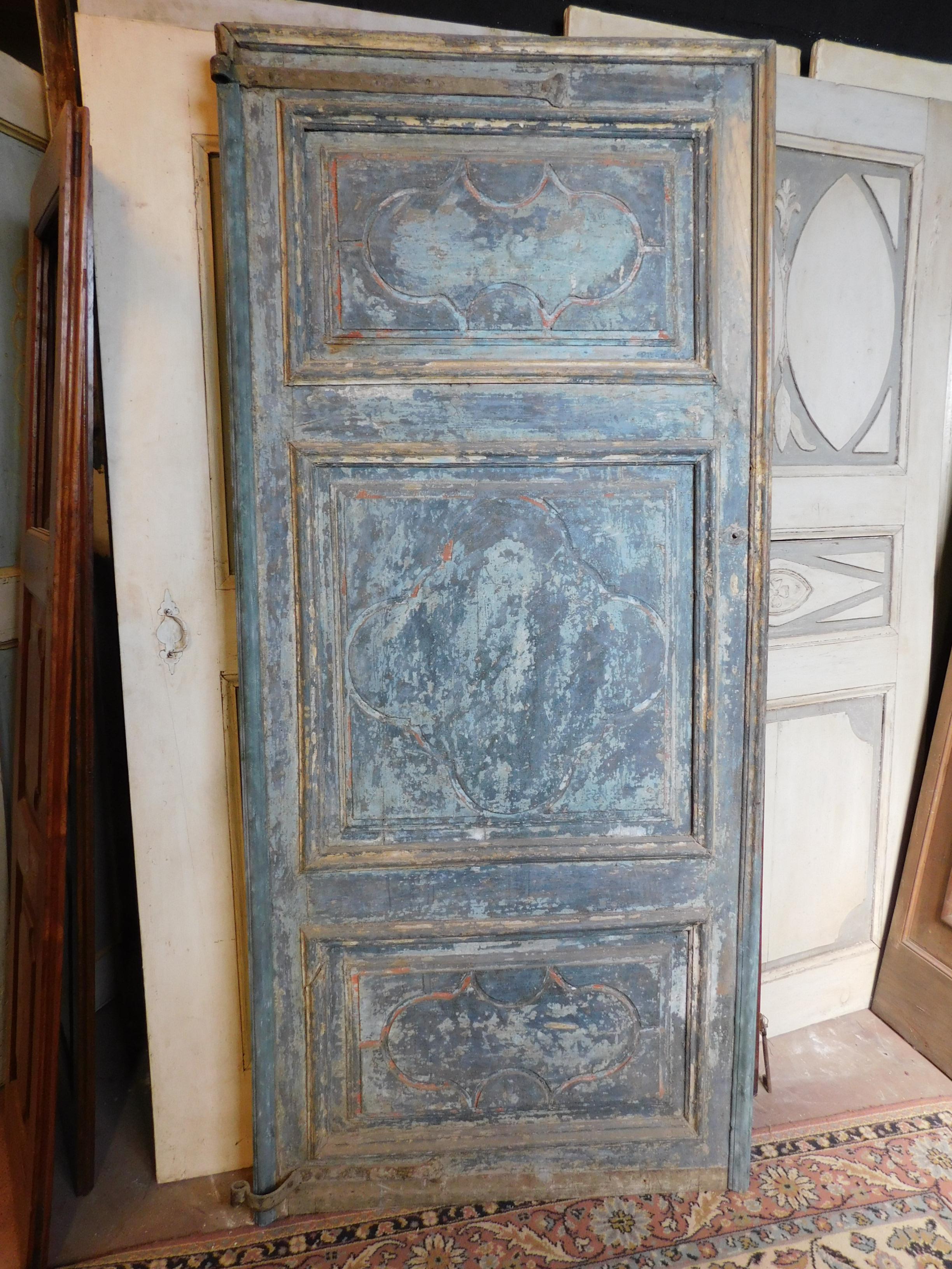 Antique blue lacquered door, in original and wonderful patina, sculpted with three panels with ancient tiles, built entirely by hand in the 18th century for an important palace in Italy (Piedmont). Also finished on the back with panels and molure,