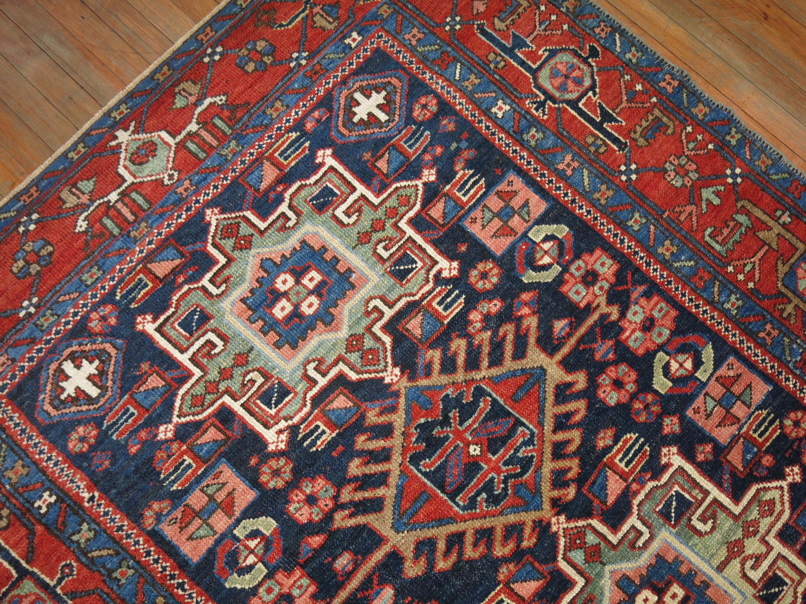 Rare size colorful antique Persian Heriz Karadja rug.