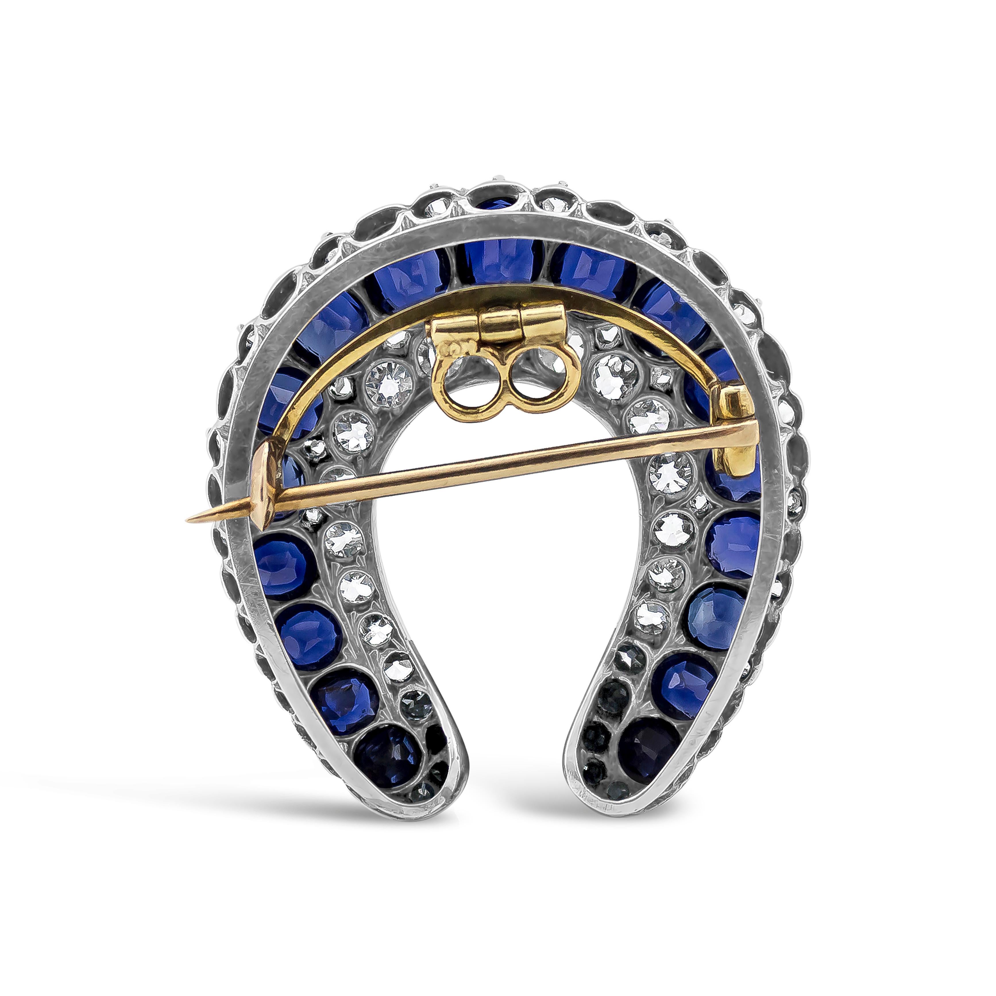 Antique brooch showcasing 10.00 carats total of graduating oval cut blue sapphires, accented with old mine cut diamonds weighing 3.00 carats total. Natural No-Heat.



