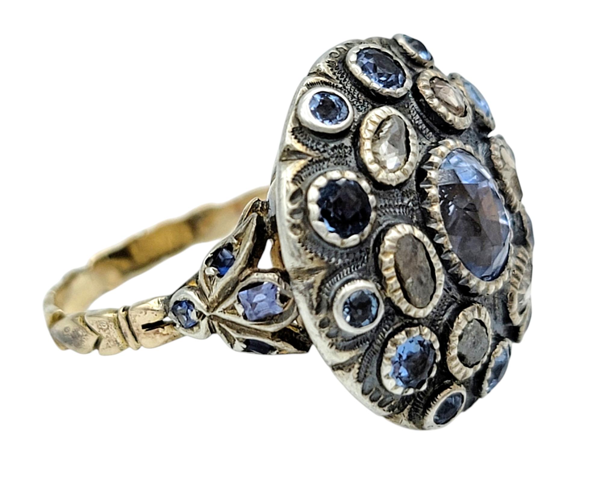 Contemporary Antique Blue Sapphire and Multi-Diamond Poison Ring in 12 Karat Gold and Silver