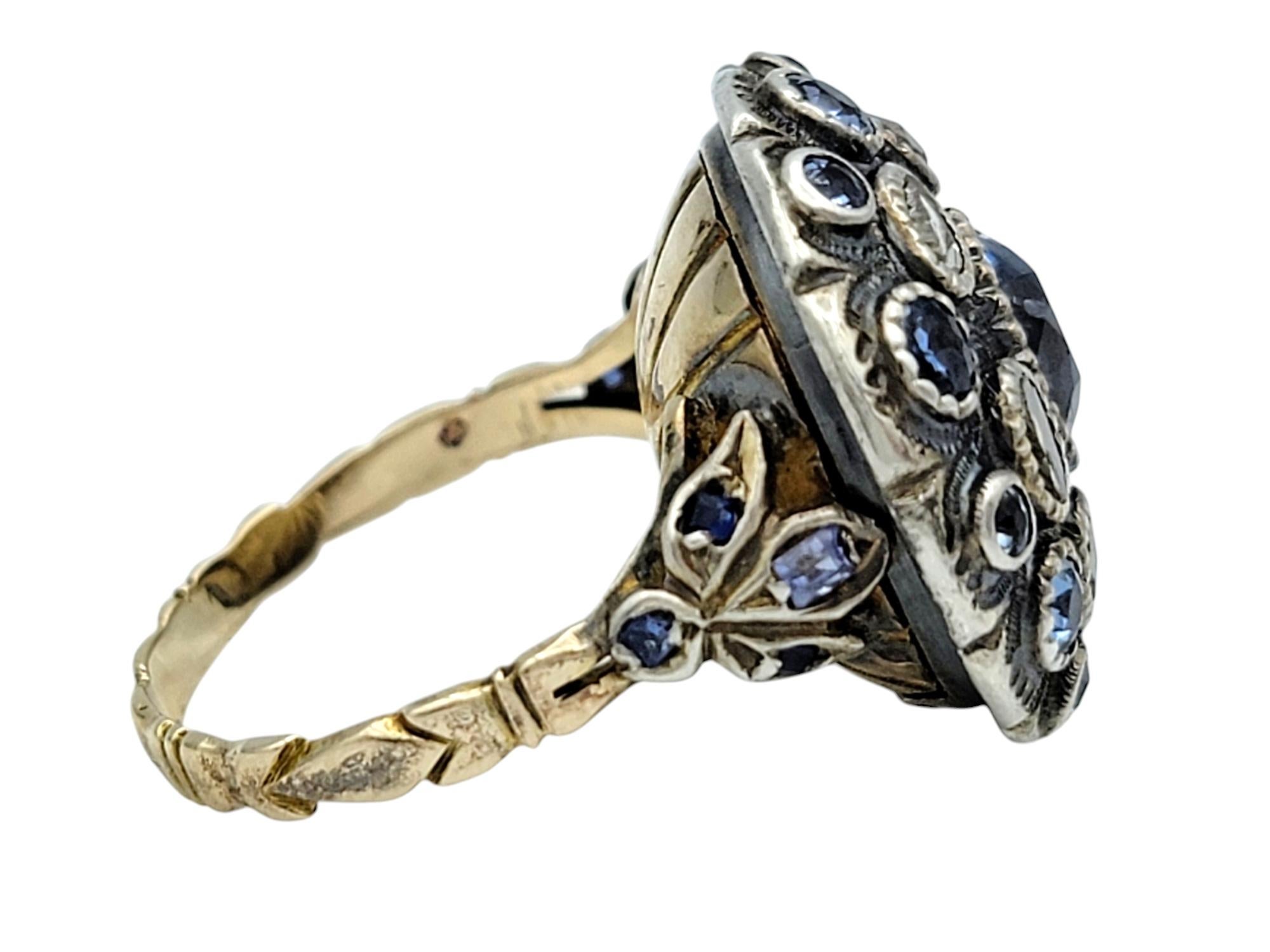 Oval Cut Antique Blue Sapphire and Multi-Diamond Poison Ring in 12 Karat Gold and Silver